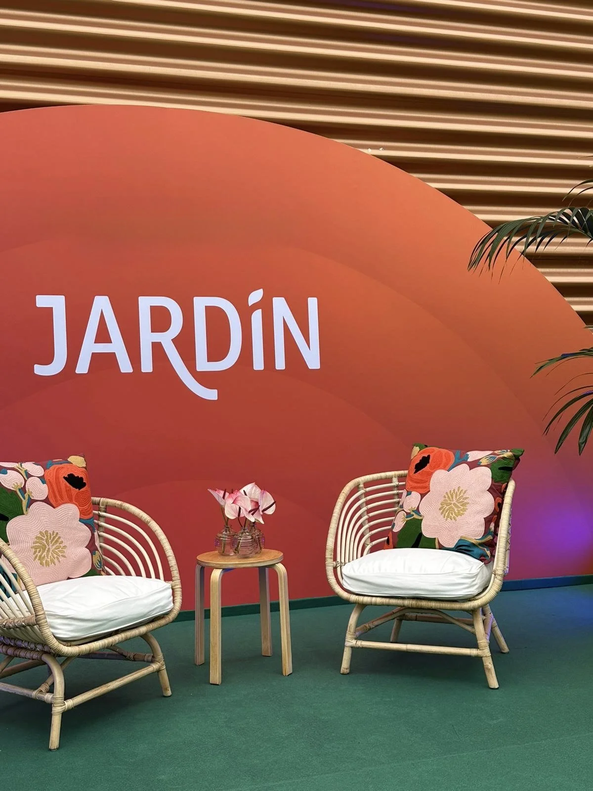 Elegant floral styling by Mosaic Flowers for a luxury international brand lounge at Mobile World Congress 2023, featuring handcrafted orchid arrangements that enhanced a creative hospitality space with refined botanical design