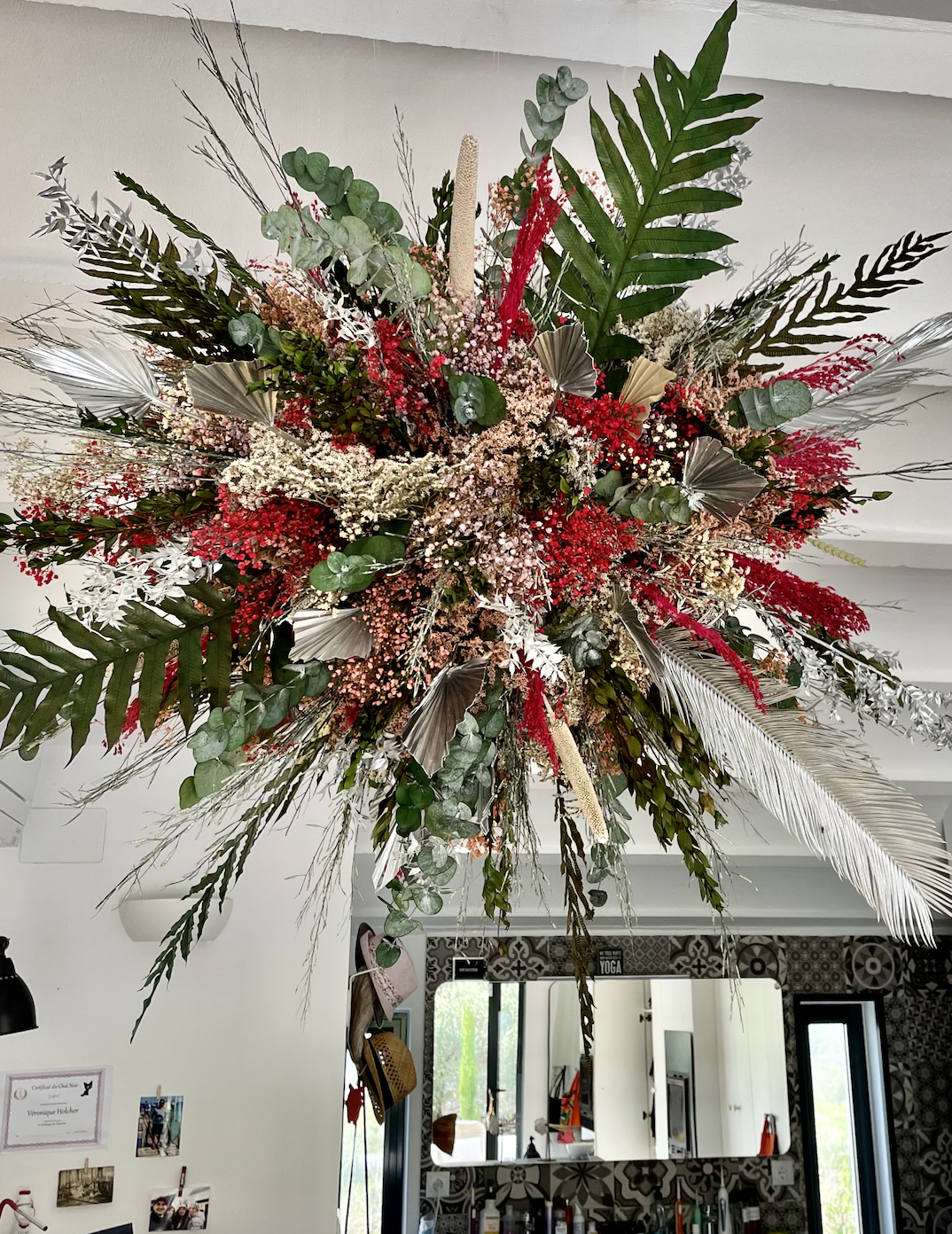 Close-up of Mosaic’s floating floral installation, showcasing hand-painted preserved flowers designed for high-end homes in Barcelona