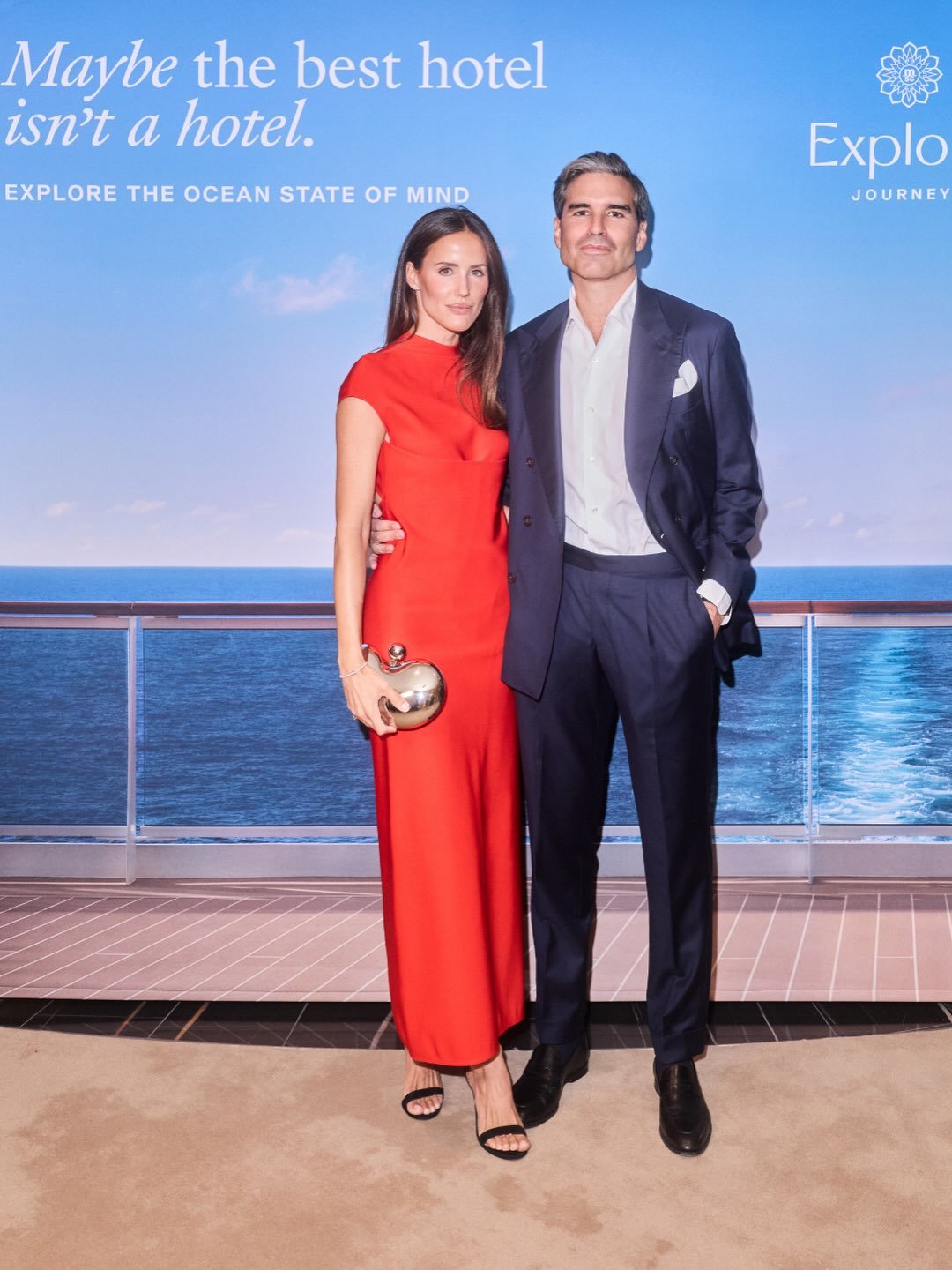 Guests posing on the red carpet during the Explora III inauguration event