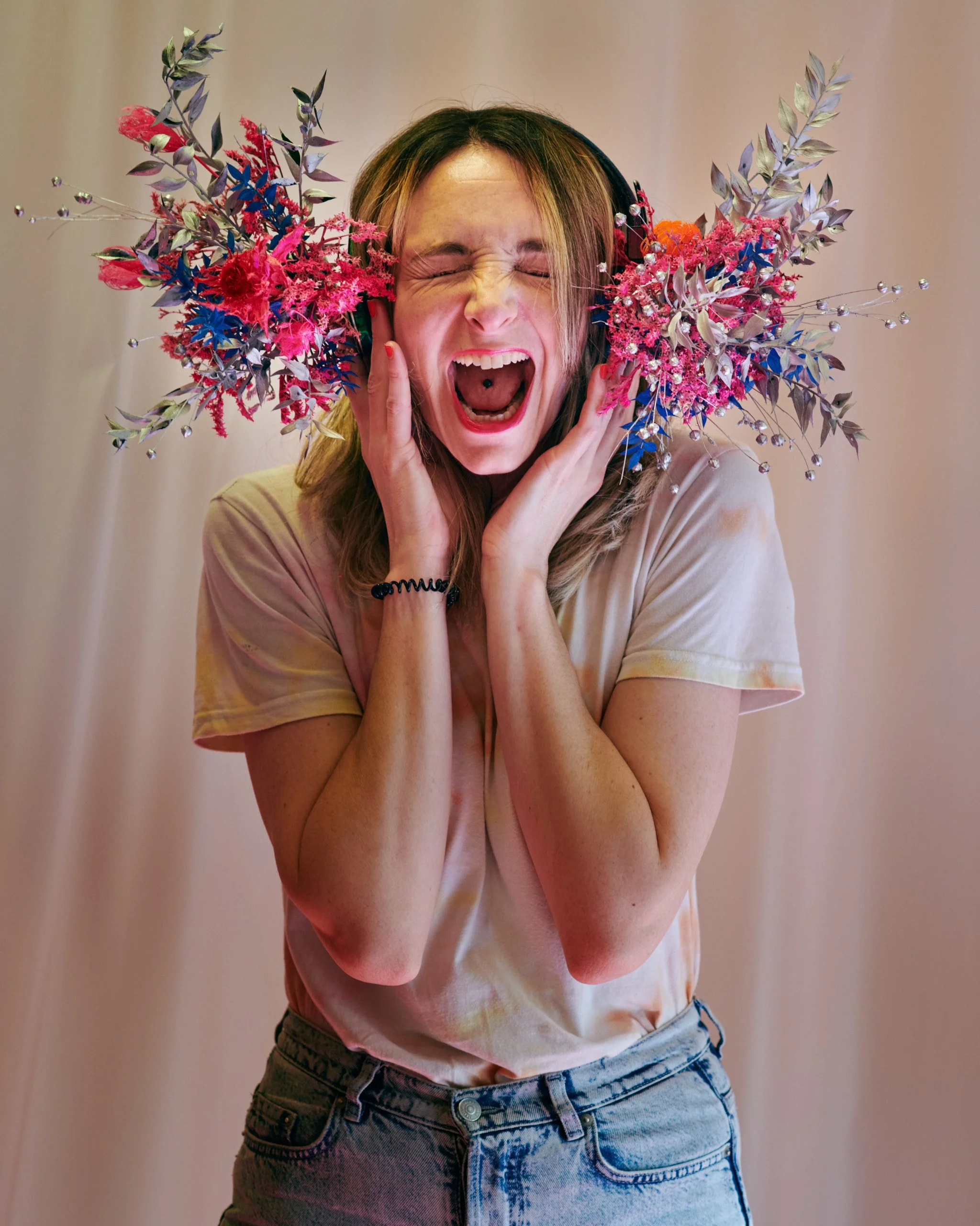 Explosive floral headphones installation by Mosaic, part of The Bathroom immersive floral art exhibition