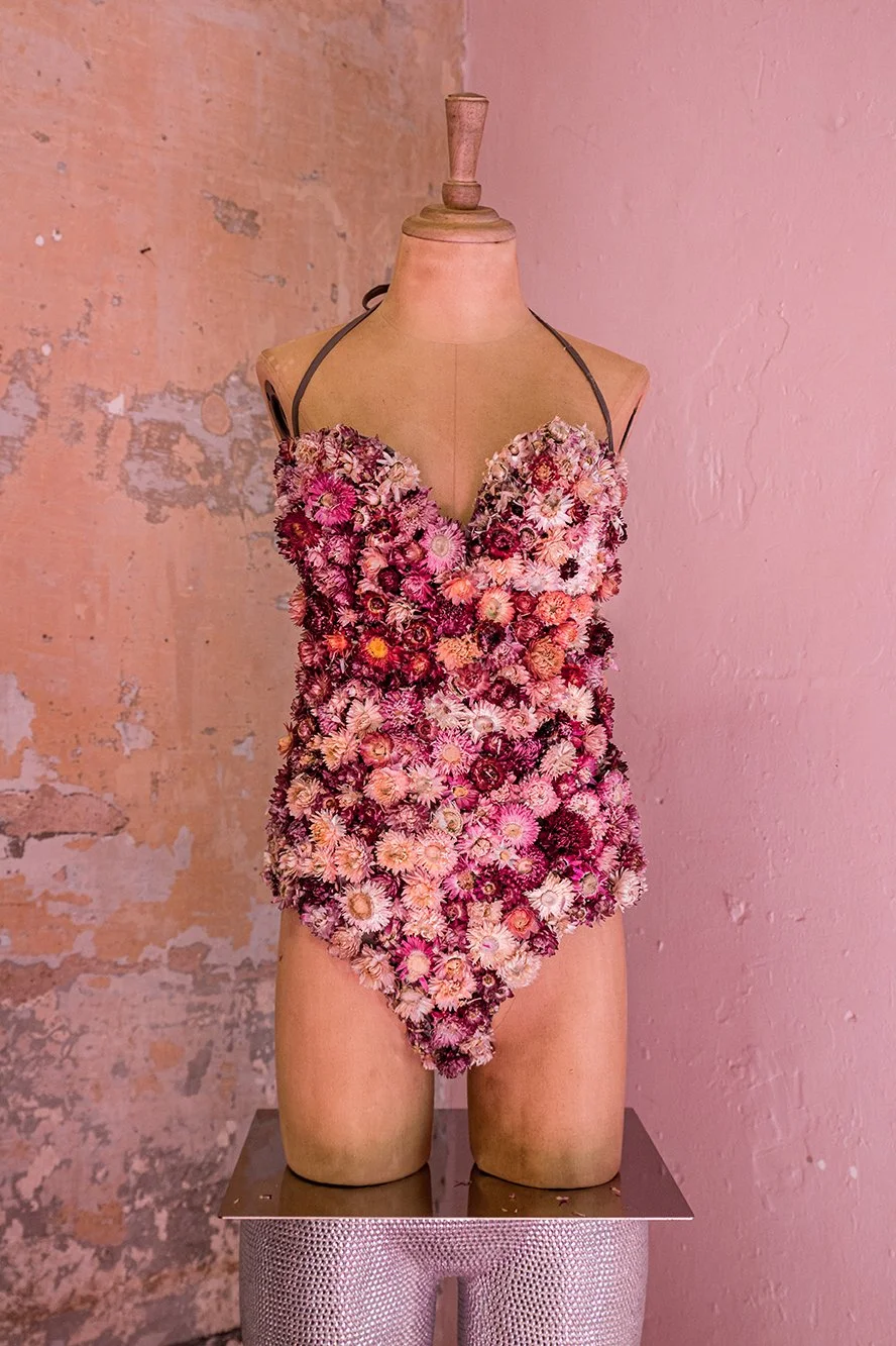 Mannequin wearing unique floral bathing suit installation by Mosaic at “The Flower Experience"