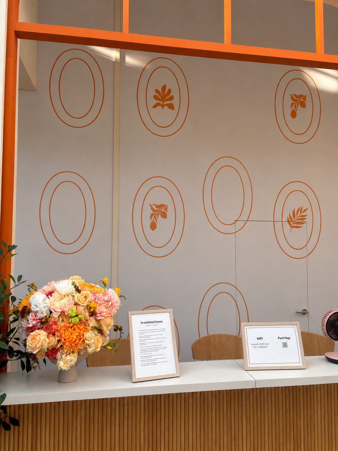 Elegant reception styling with bespoke floral arrangements by Mosaic Flowers for a premium international brand activation during the Cannes Lions Festival