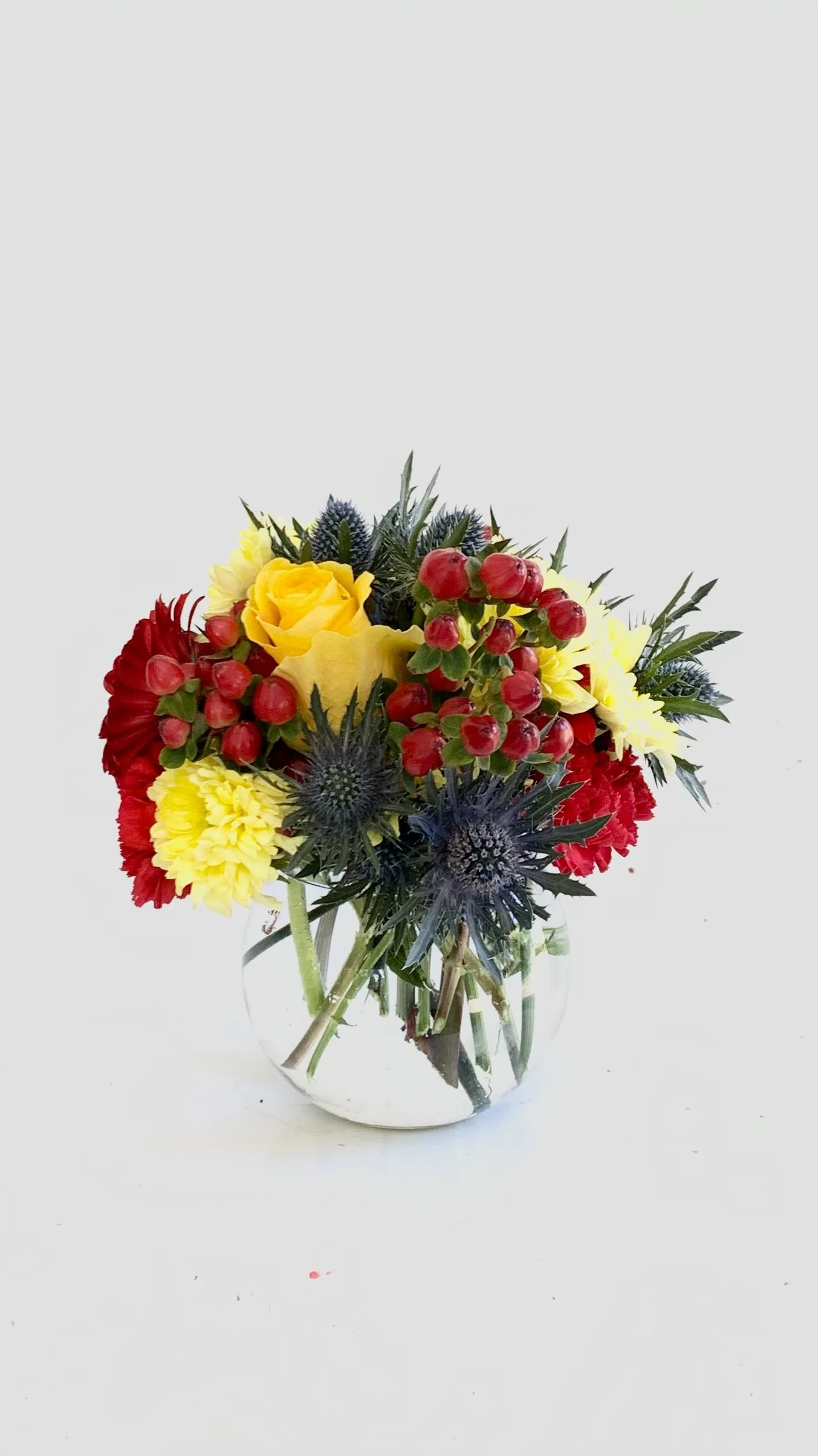 Bespoke floral arrangement by Mosaic Flowers celebrating the Lidl Trek team with premium seasonal flowers in the team's signature colours for the Tour de France Barcelona 2026
