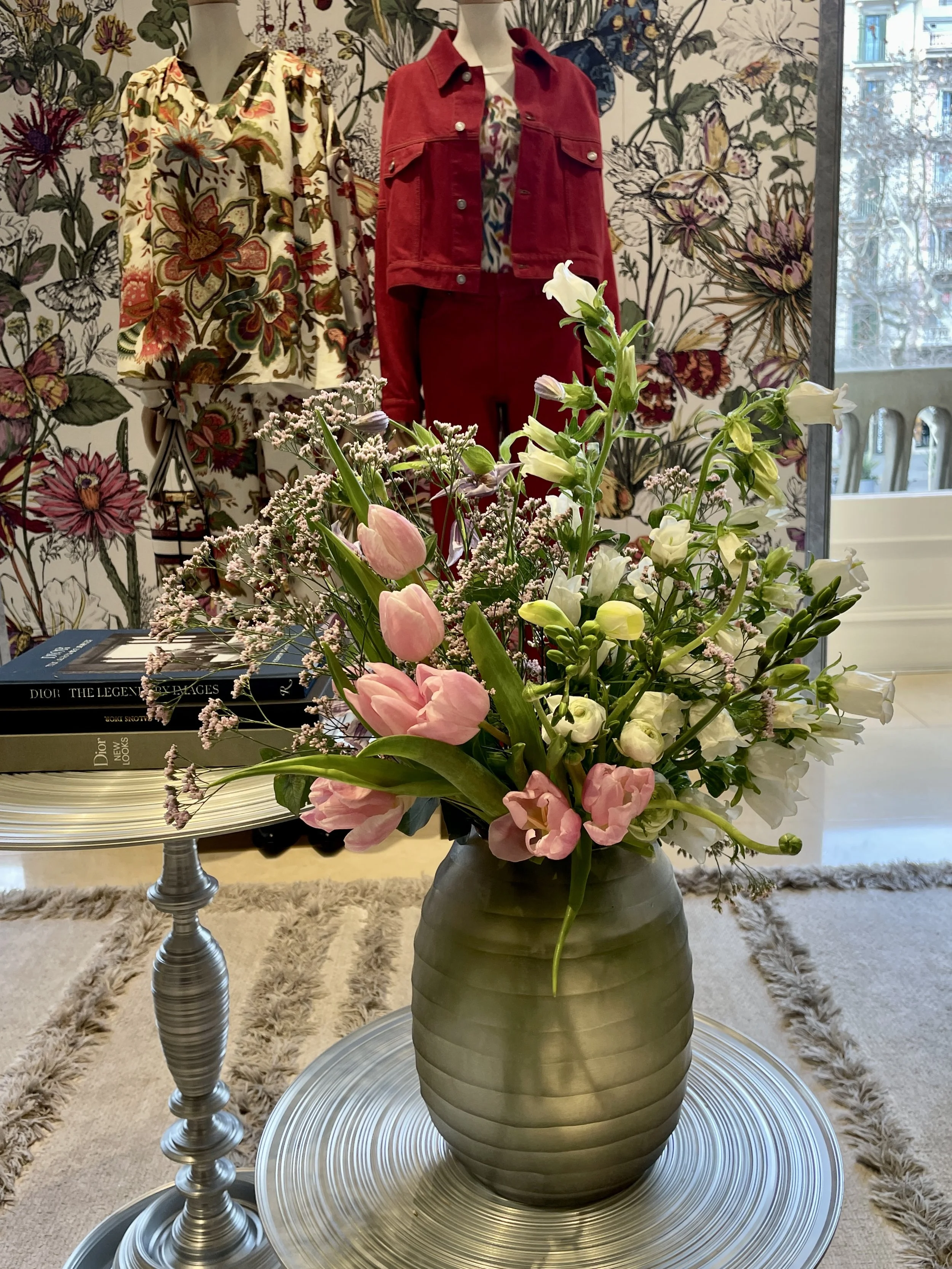 Lush bouquet in pink and purple tones designed by Mosaic Flowers for Christian Dior Spring 24