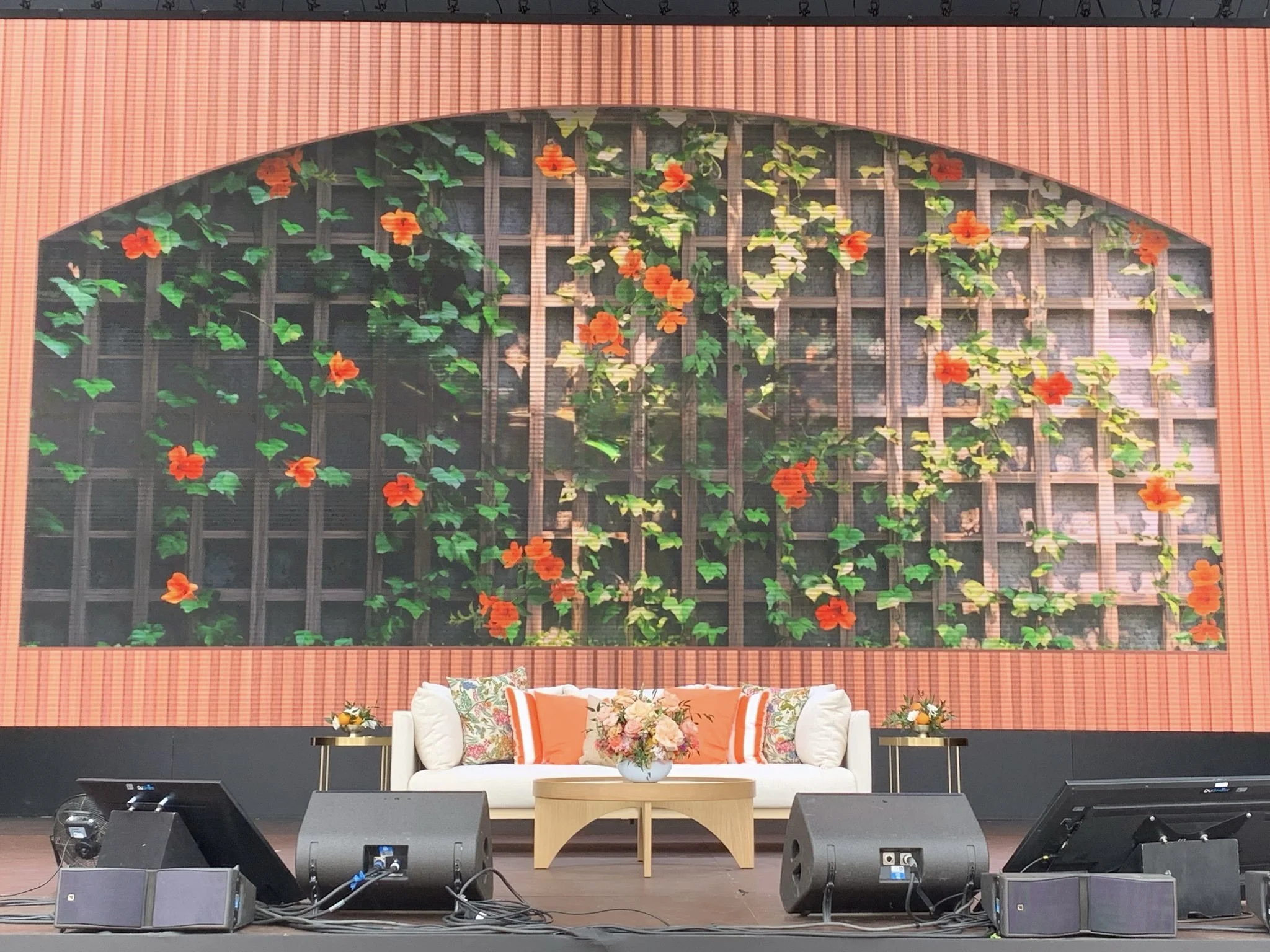 Close-up of a generous floral backdrop created by Mosaic Flowers for an international brand at Cannes Lions Festival 2025, featuring premium roses, garden flowers and lush Mediterranean greenery