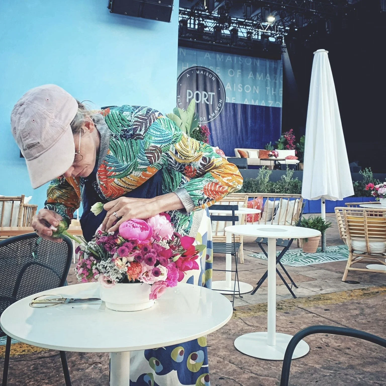 Floral designer from Mosaic Flowers creating a bespoke luxury arrangement on-site during Cannes Lions Festival 2025 for an international brand event in Cannes