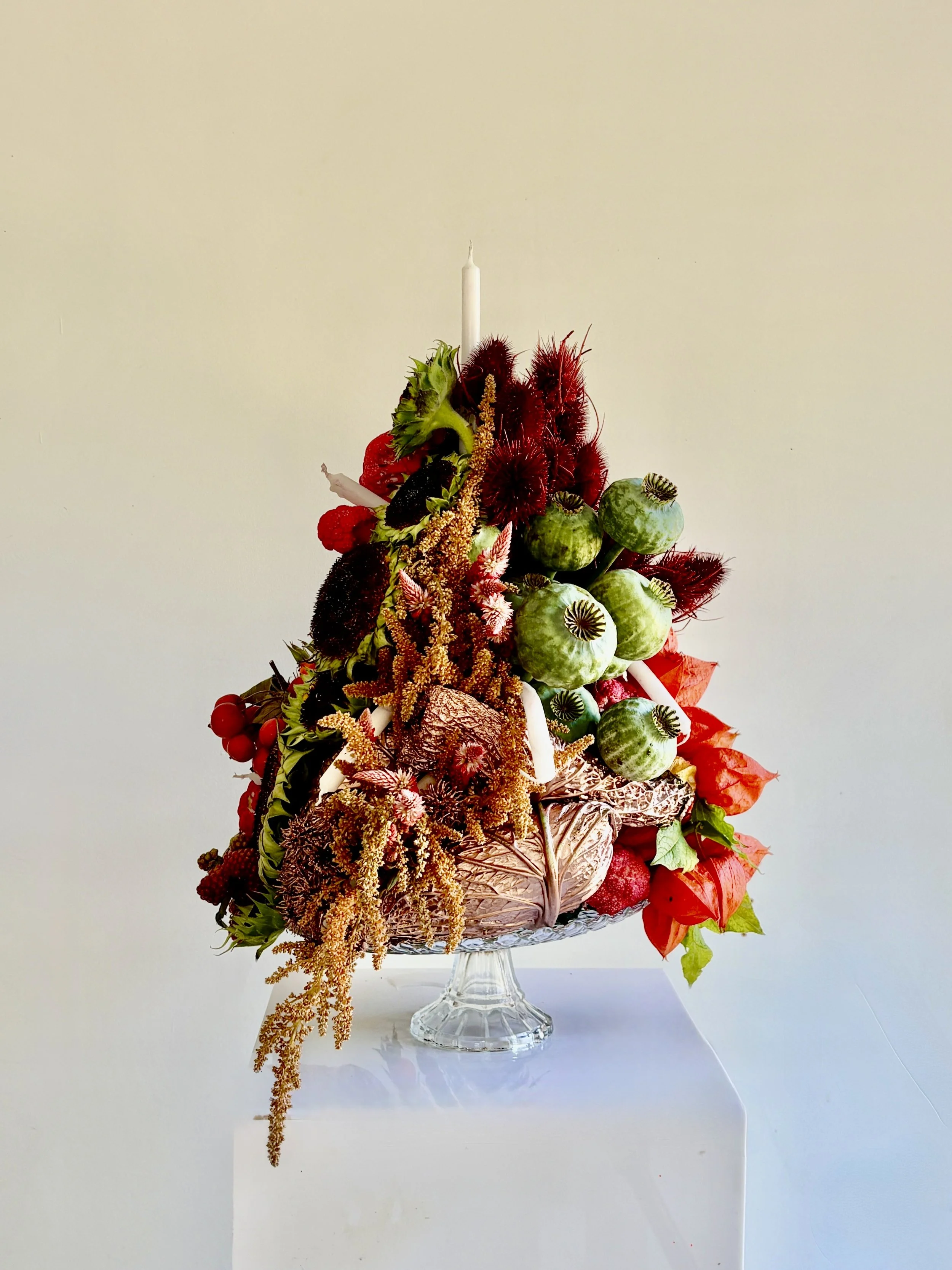 Mosaic creates an extraordinary floral birthday installation for designer Blanca Miró, commissioned by LA VESTE and transforming flowers, plants, fruit, vegetables and candles into a striking sculptural centerpiece