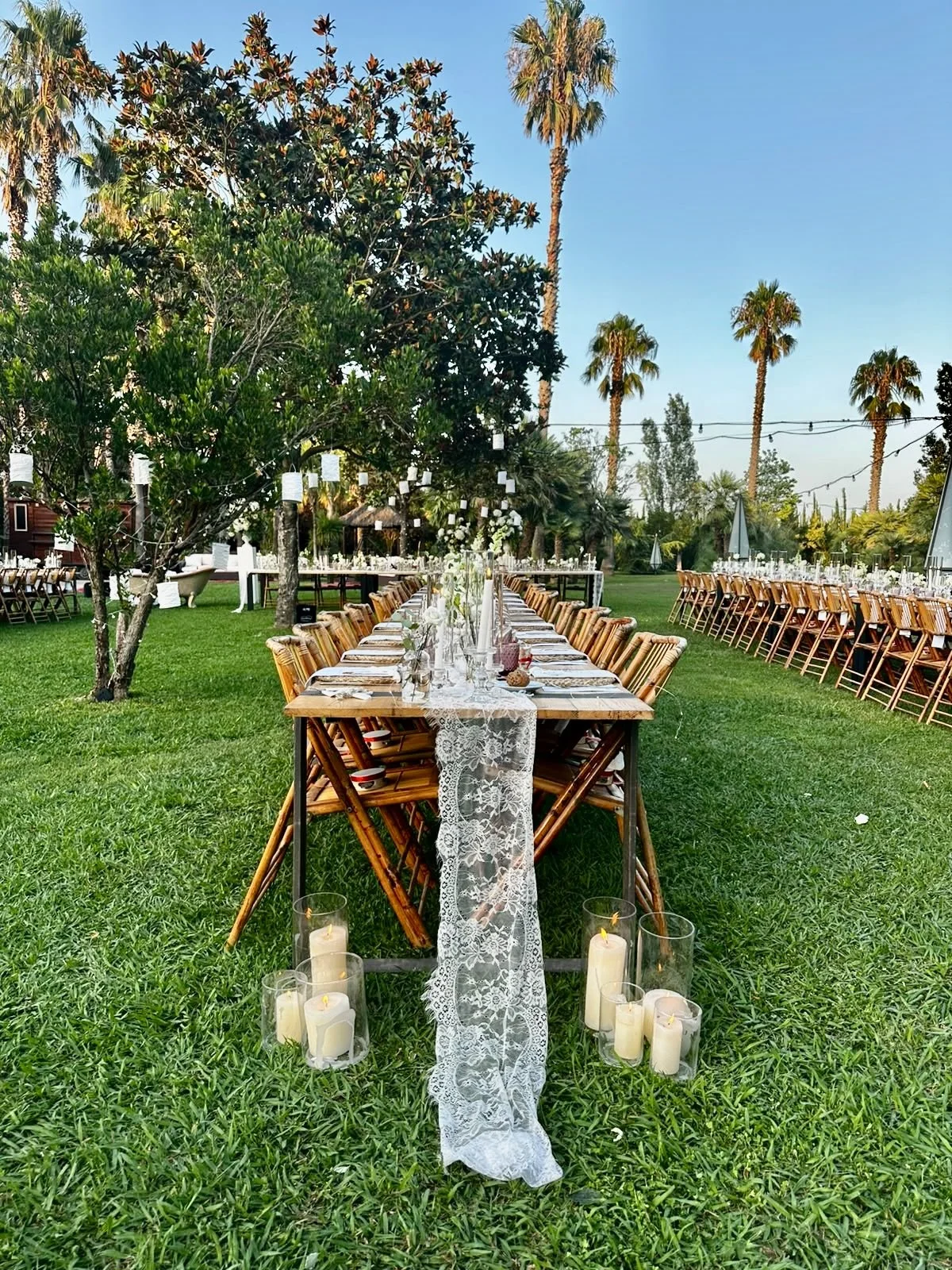 Sculptural white floral arrangements in elegant vases form part of Mosaic’s bespoke floral scenography for Megan and Shane’s wedding at Cortal Gran in Catalonia