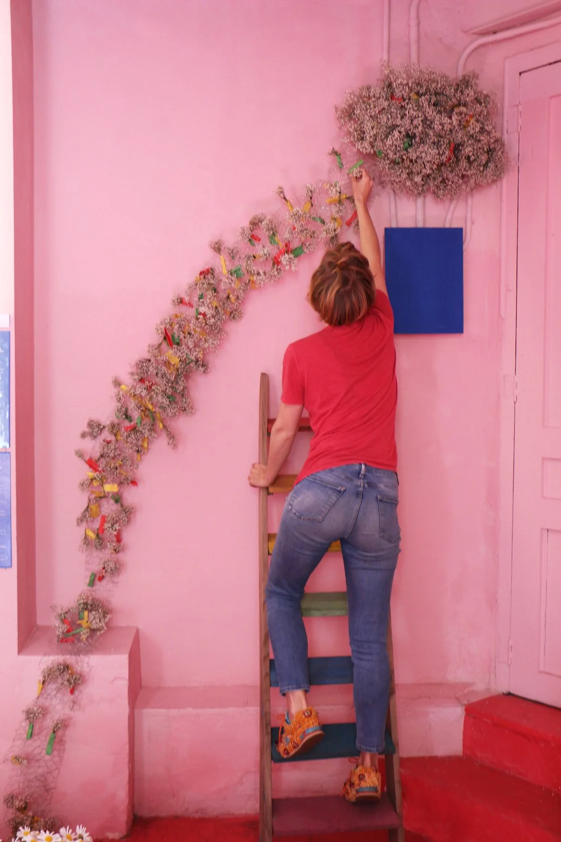 Floral artist Margaux working on collaborative installation for Mosaic’s “The Flower Experience"