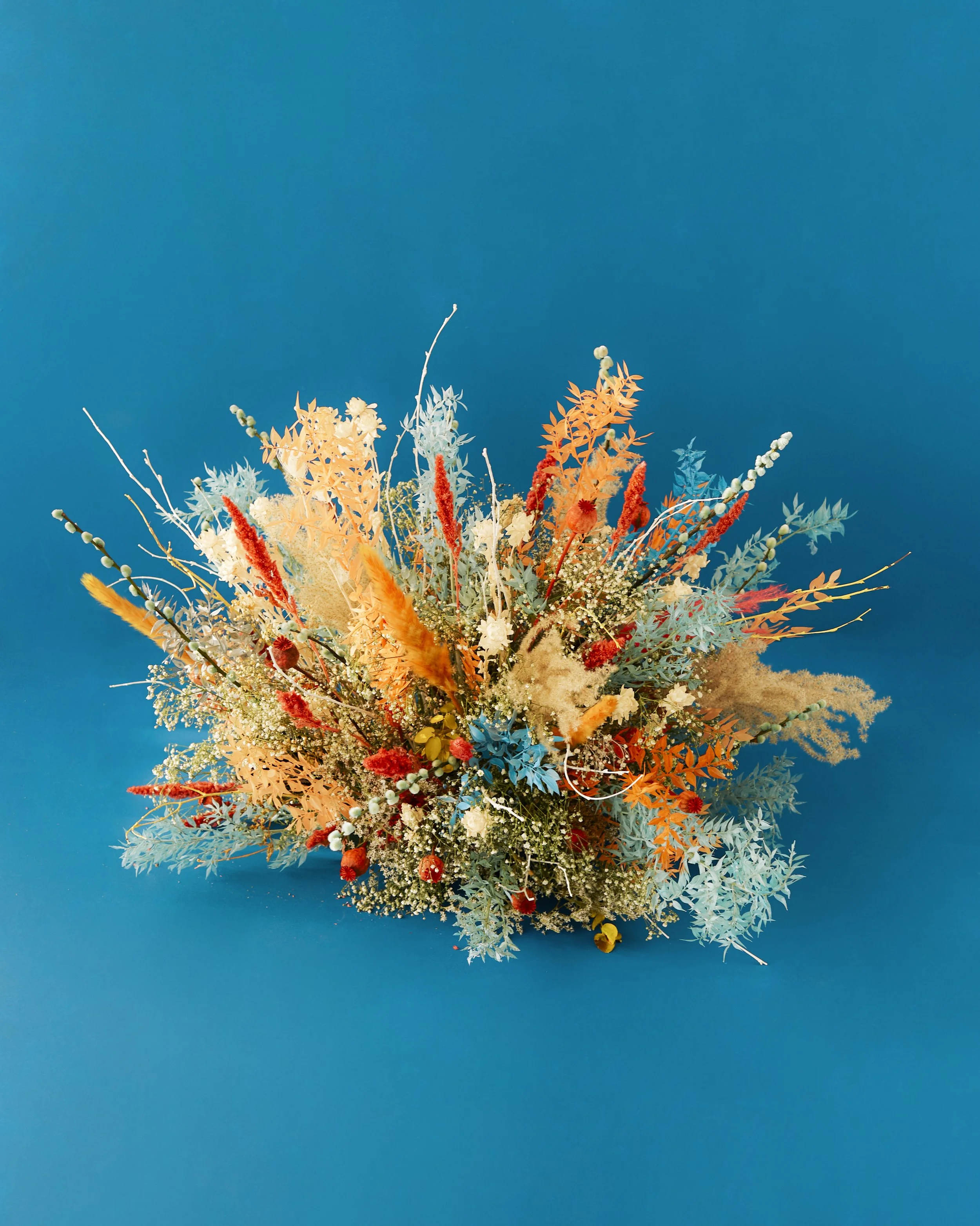 Luxury floral art installation “L’Explosion” created by Mosaic with vibrant preserved flowers in Barcelona