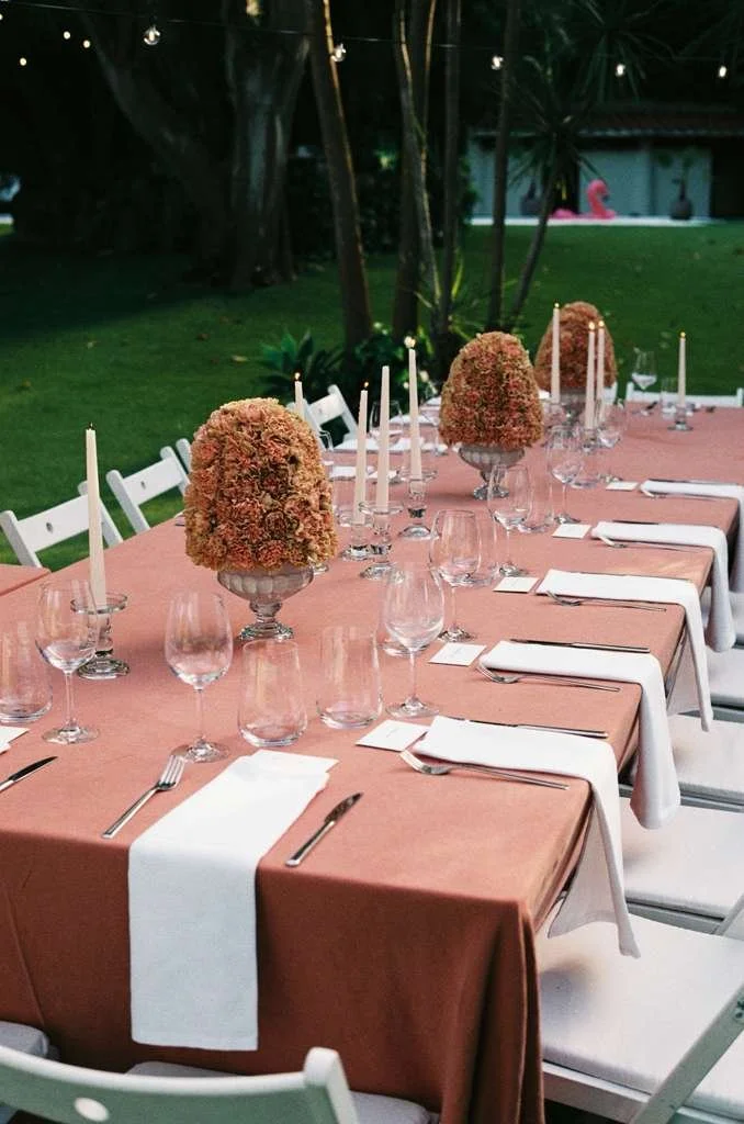 Bespoke floral centrepiece enhancing the wedding dinner tables with premium seasonal flowers and refined craftsmanship