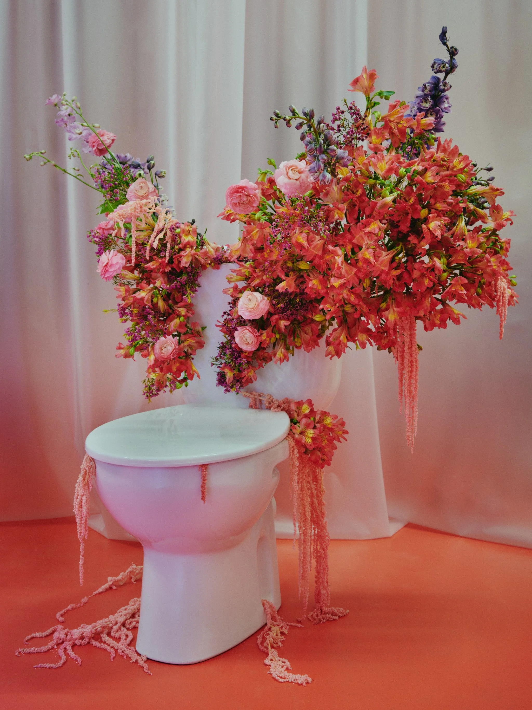 Flowers blurred behind a curtain with steam effect, immersive floral detail from The Bathroom exhibition by Mosaic