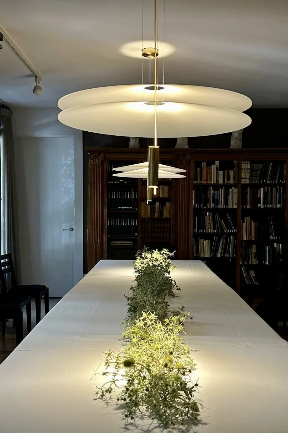 Bespoke floral tablescape featuring a 15-metre graphic botanical runner designed for the exclusive opening dinner of the Miquel Barceló exhibition at Artur Ramon Art Gallery, organized by La Culture House and Helena Agustí