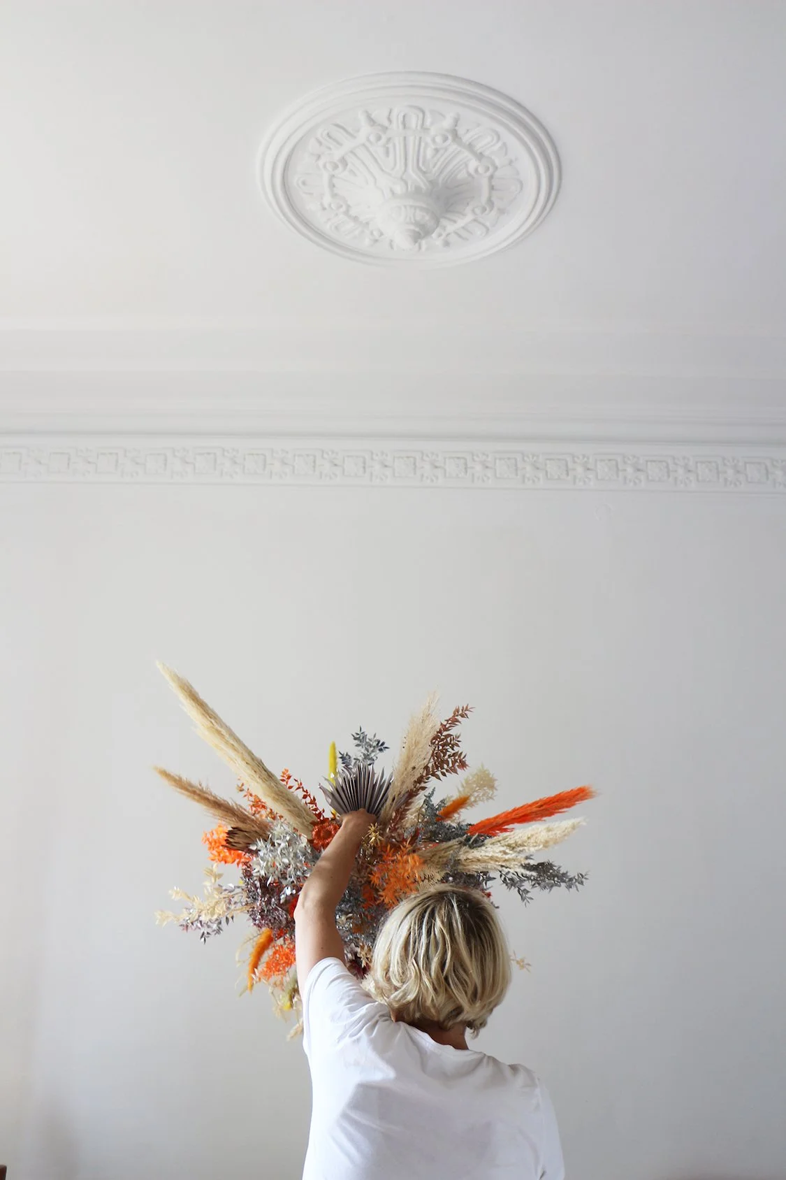 Luxury Eixample flat decorated with Mosaic’s bespoke hanging floral sculpture for international brand clients