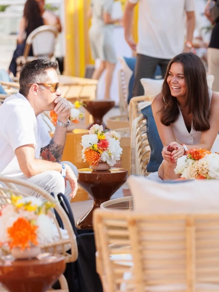 Luxury floral centerpiece in a ceramic vase styling the Amazon House lounge at Cannes Lions Festival of Creativity, creating a refined hospitality space with bespoke floral compositions for an international luxury brand event