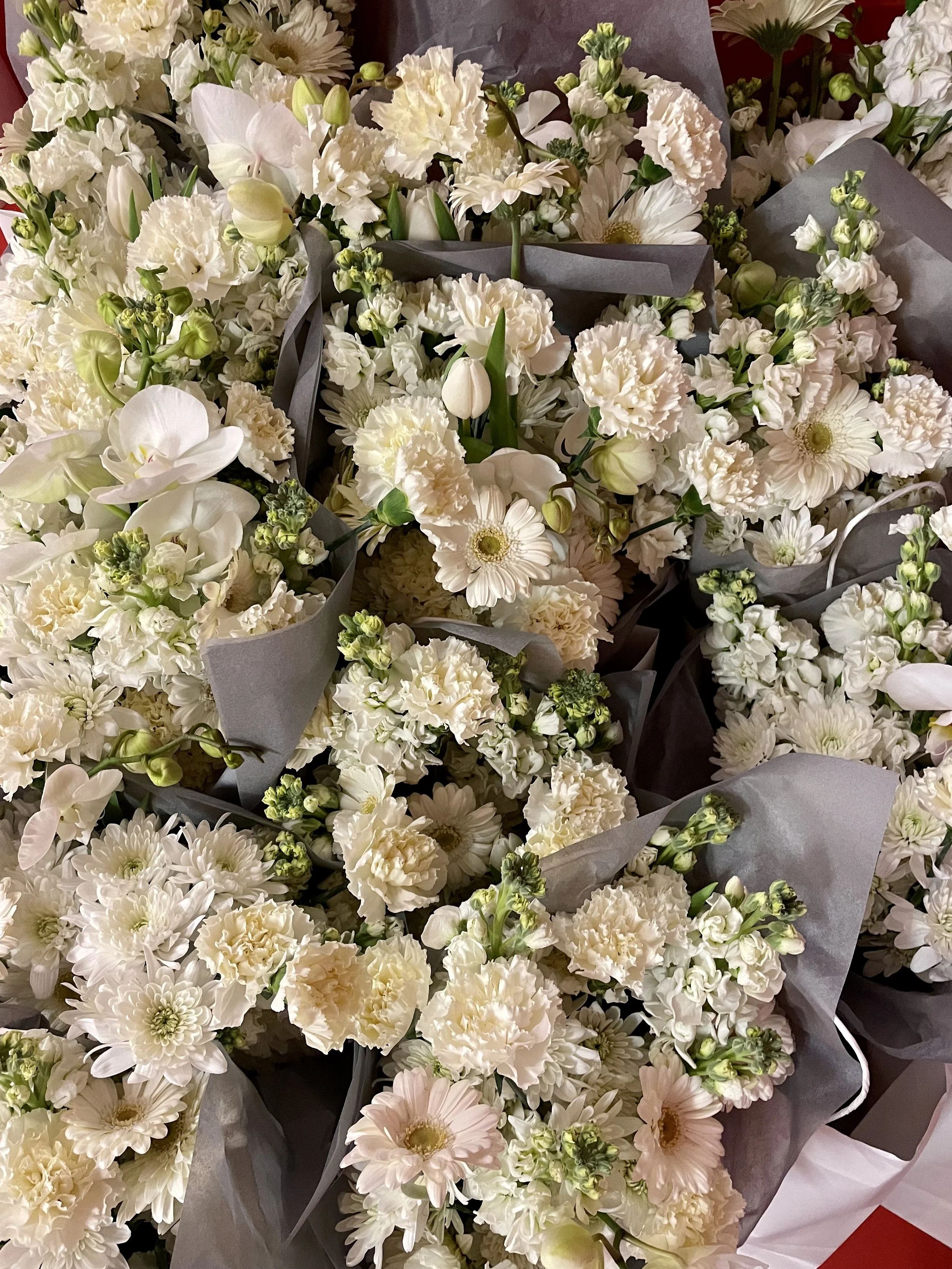 Collection of premium white flower bouquets created by Mosaic for Balenciaga’s luxury client gifting in Barcelona