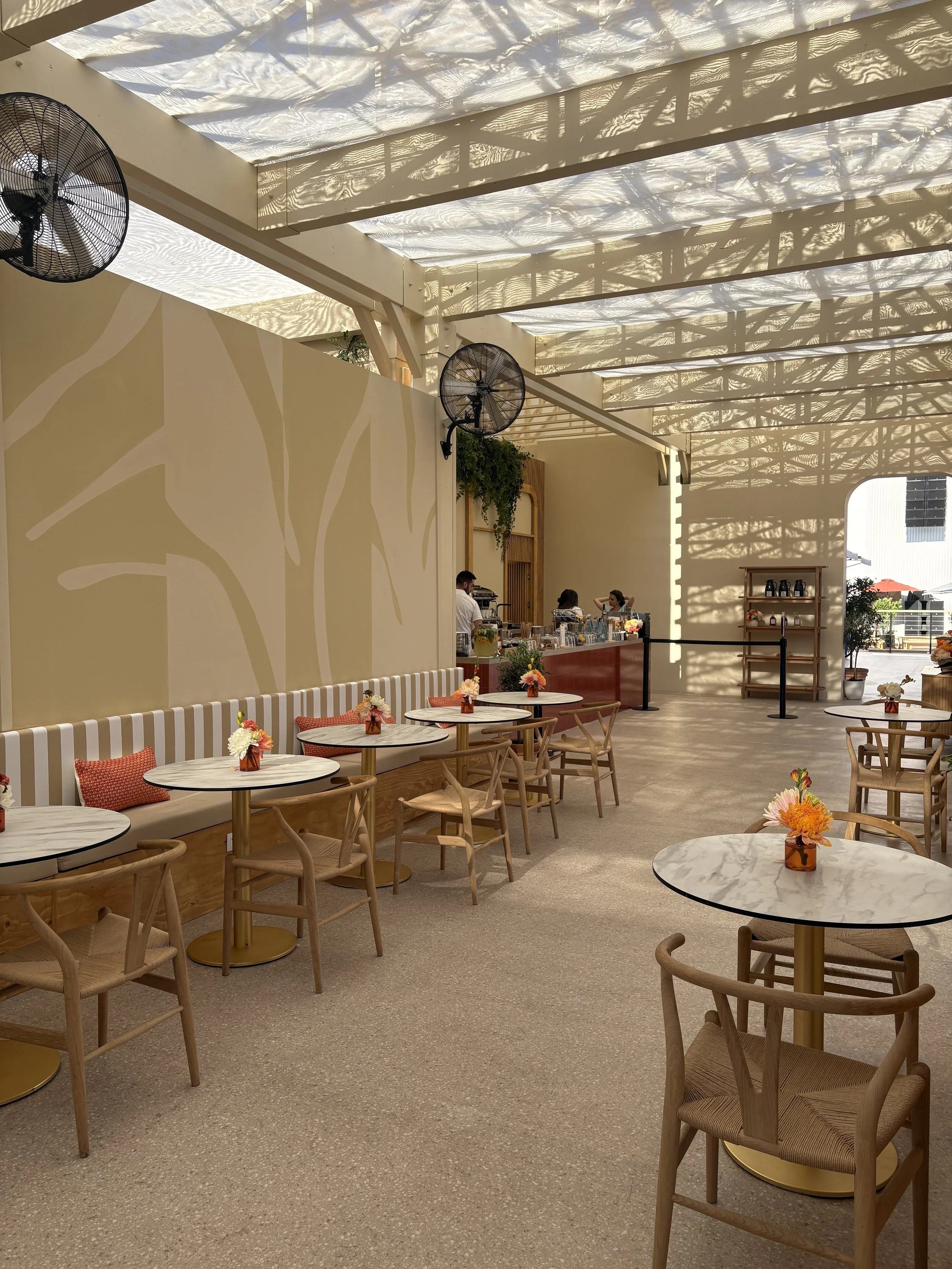 Bespoke floral styling throughout the Amazon hospitality space at Cannes Lions, showcasing artistic luxury arrangements refreshed daily across the Croisette venue