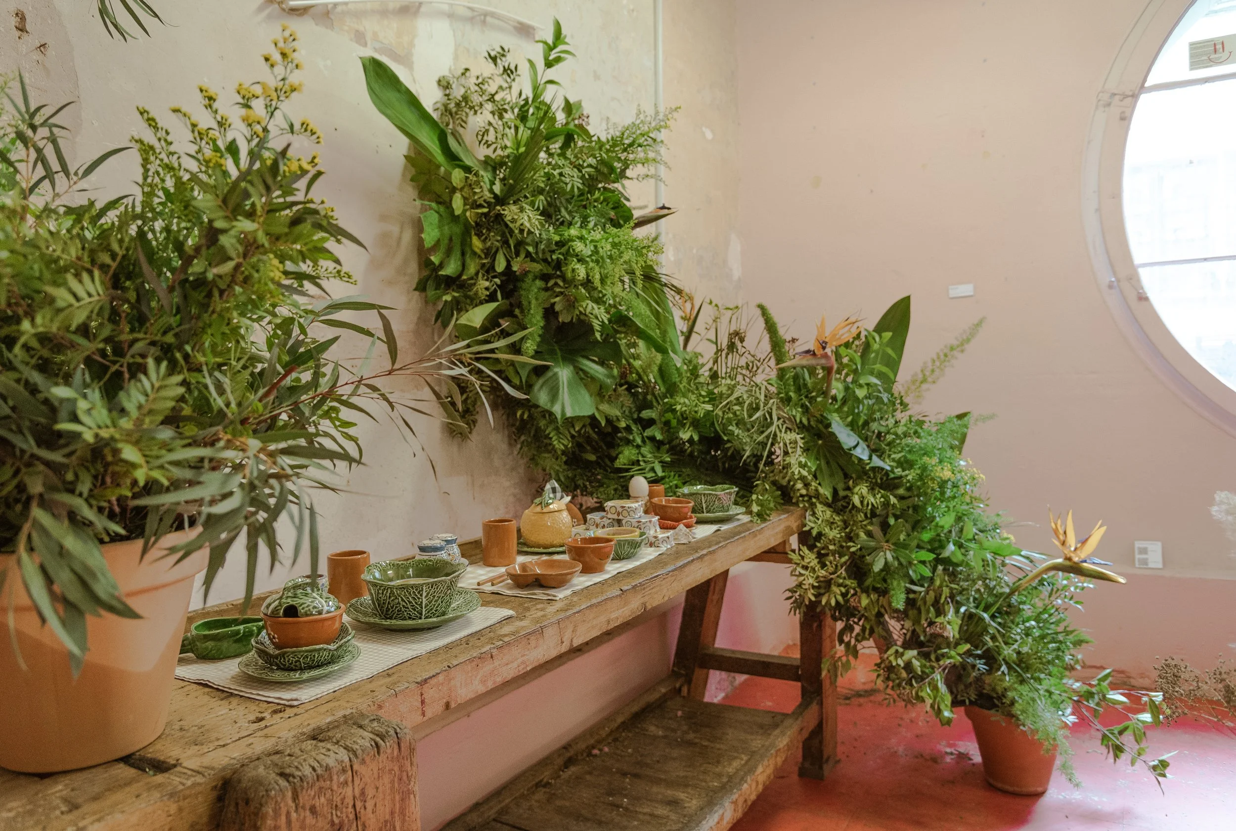 Immersive foliage installation with greenery climbing walls by Mosaic at “The Floral Experience"