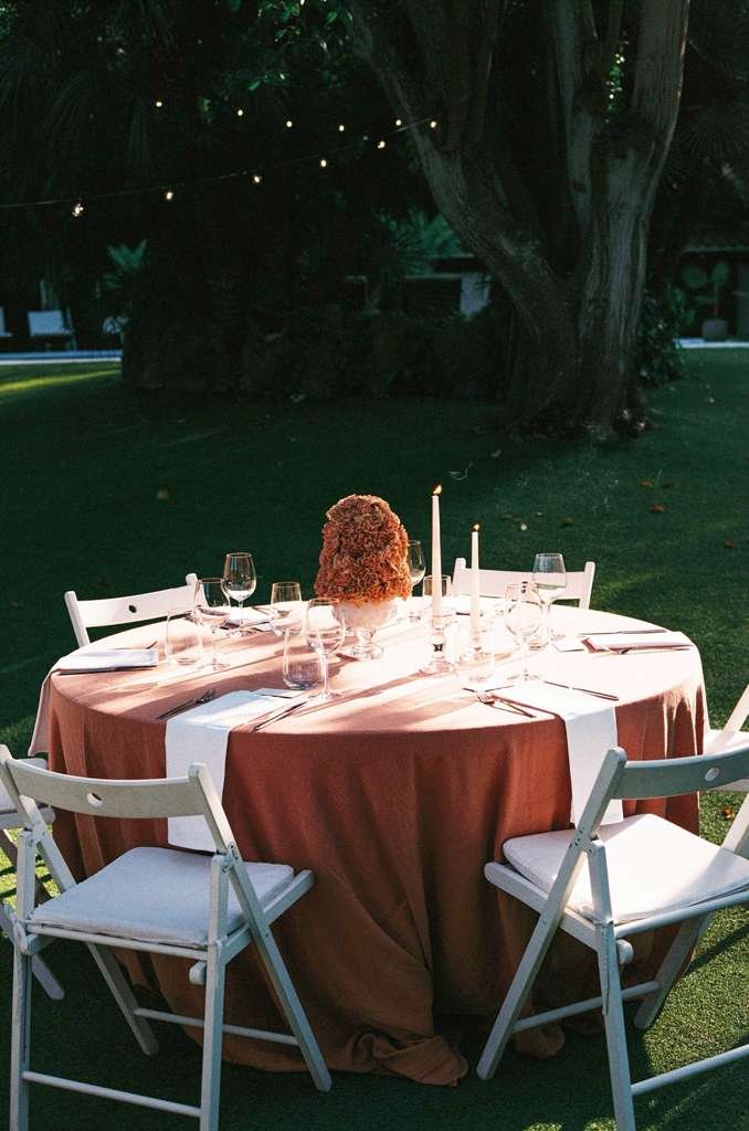 Bespoke floral styling throughout the wedding reception at Villa Almanita, featuring artistic compositions and timeless elegance