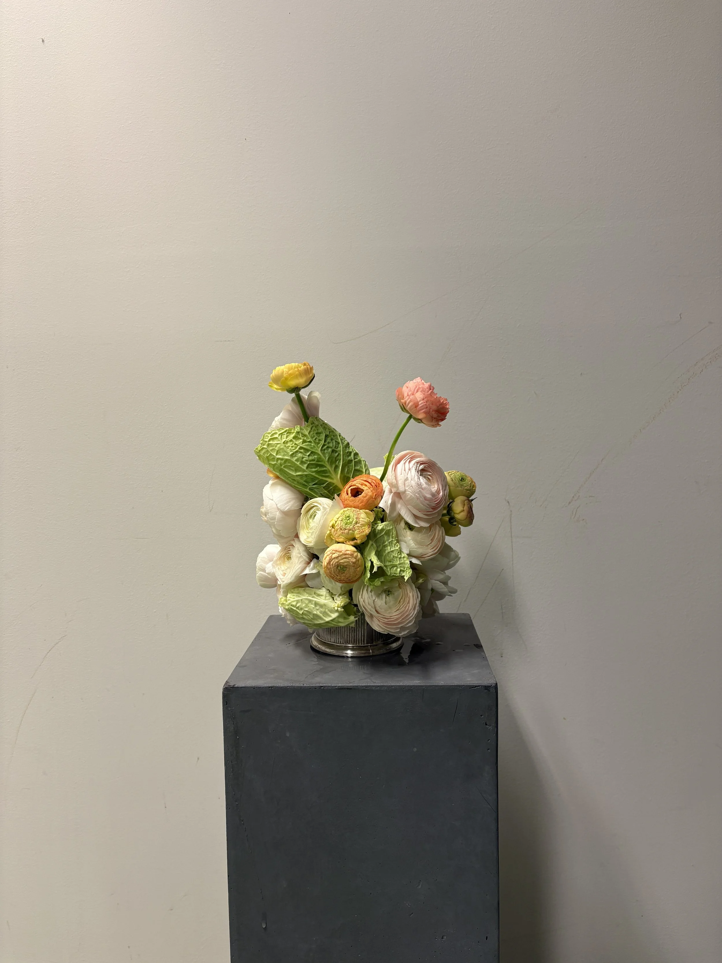 Sculptural floral arrangement featuring premium roses and seasonal blooms designed for Christie and Andrew's bespoke wedding at Villa Almanita in Catalunya