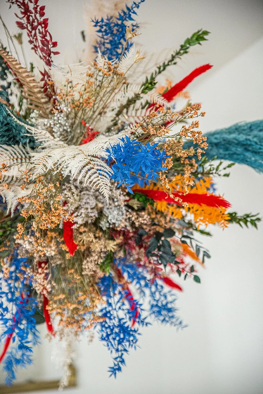 Side view of elegant floating floral installation created by Mosaic for Barcelona apartment