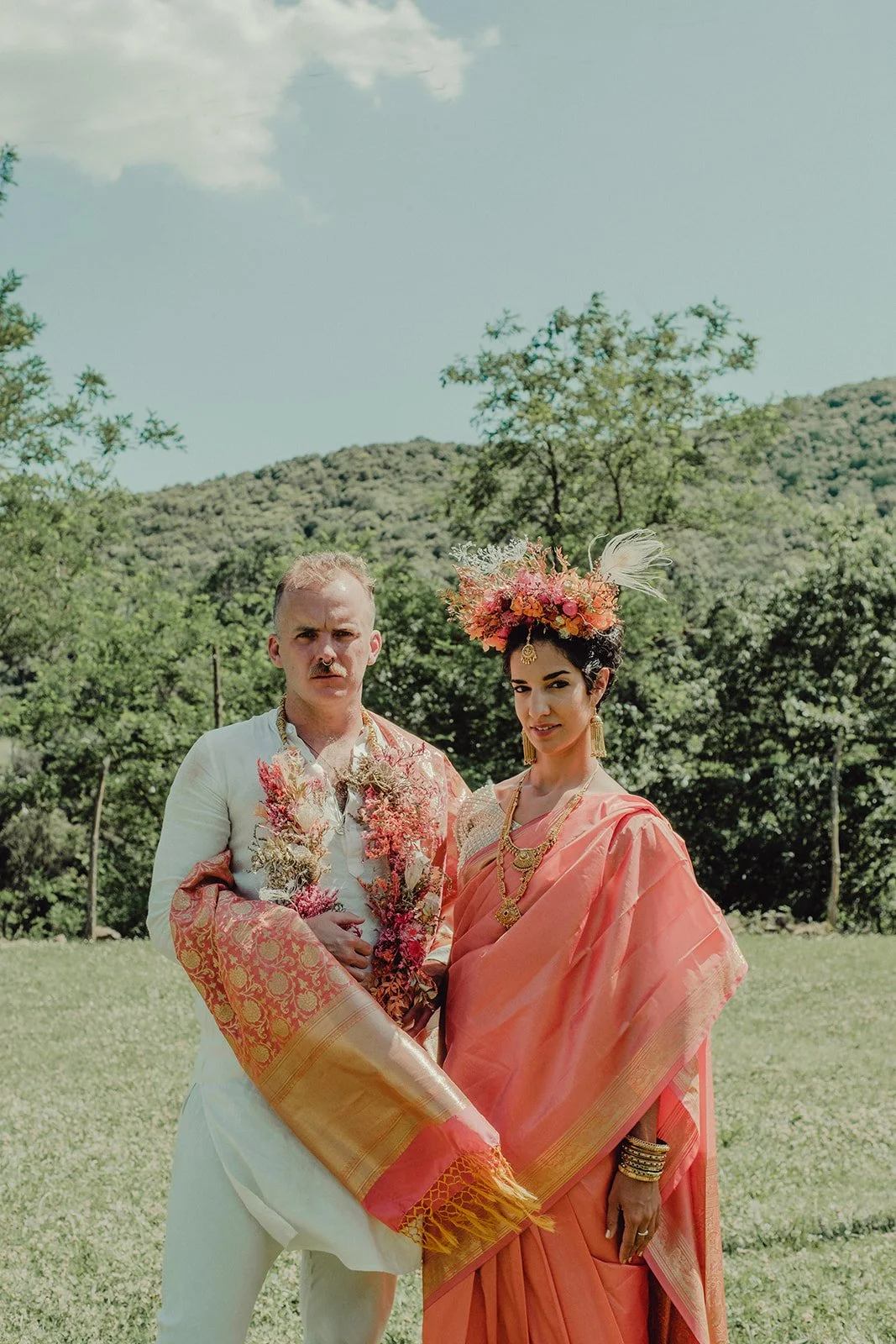 Unique and unconventional wedding celebration styled with floral art by Mosaic, featuring preserved flower crowns