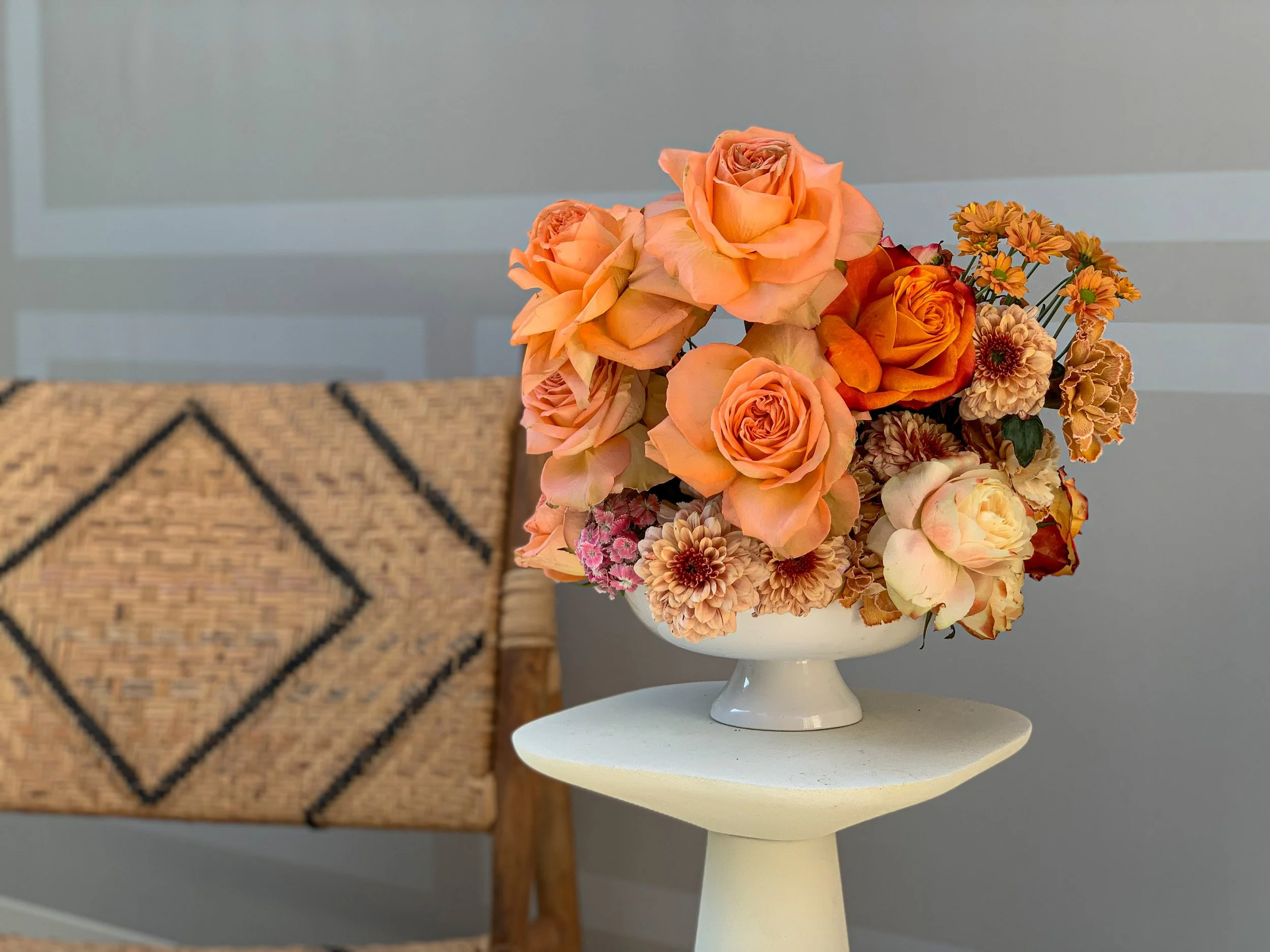 Amazon Le Pantiero lounge with rose floral centerpiece at Cannes Lions Festival.