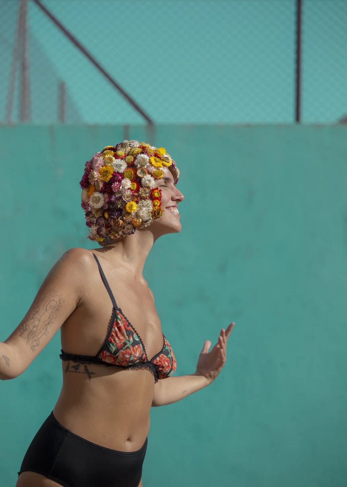 Beautiful woman with colorful bouquet styled by Mosaic Flowers in Gracia Barcelona editorial photoshoot