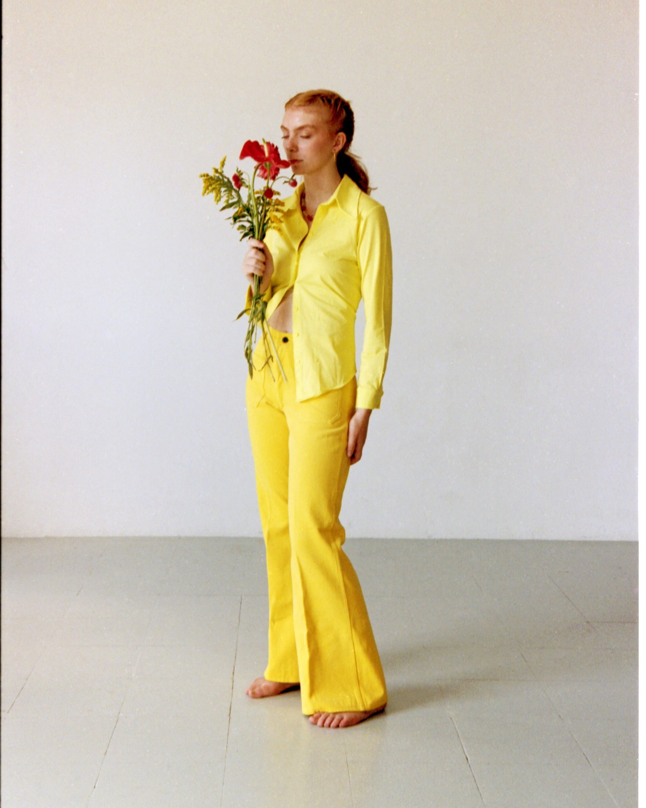 Editorial still life with a single red gerbera in a vase, styled by Mosaic for a fashion photoshoot in Barcelona