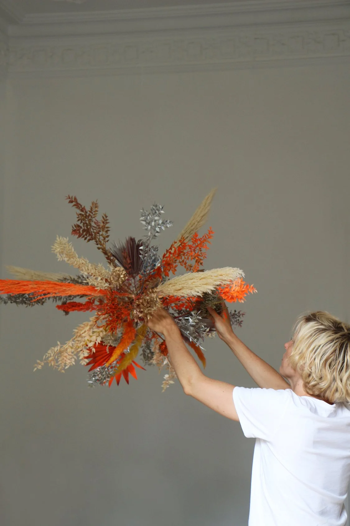 Luxury Barcelona apartment with a suspended floral sculpture by Mosaic, designed for elegant private events