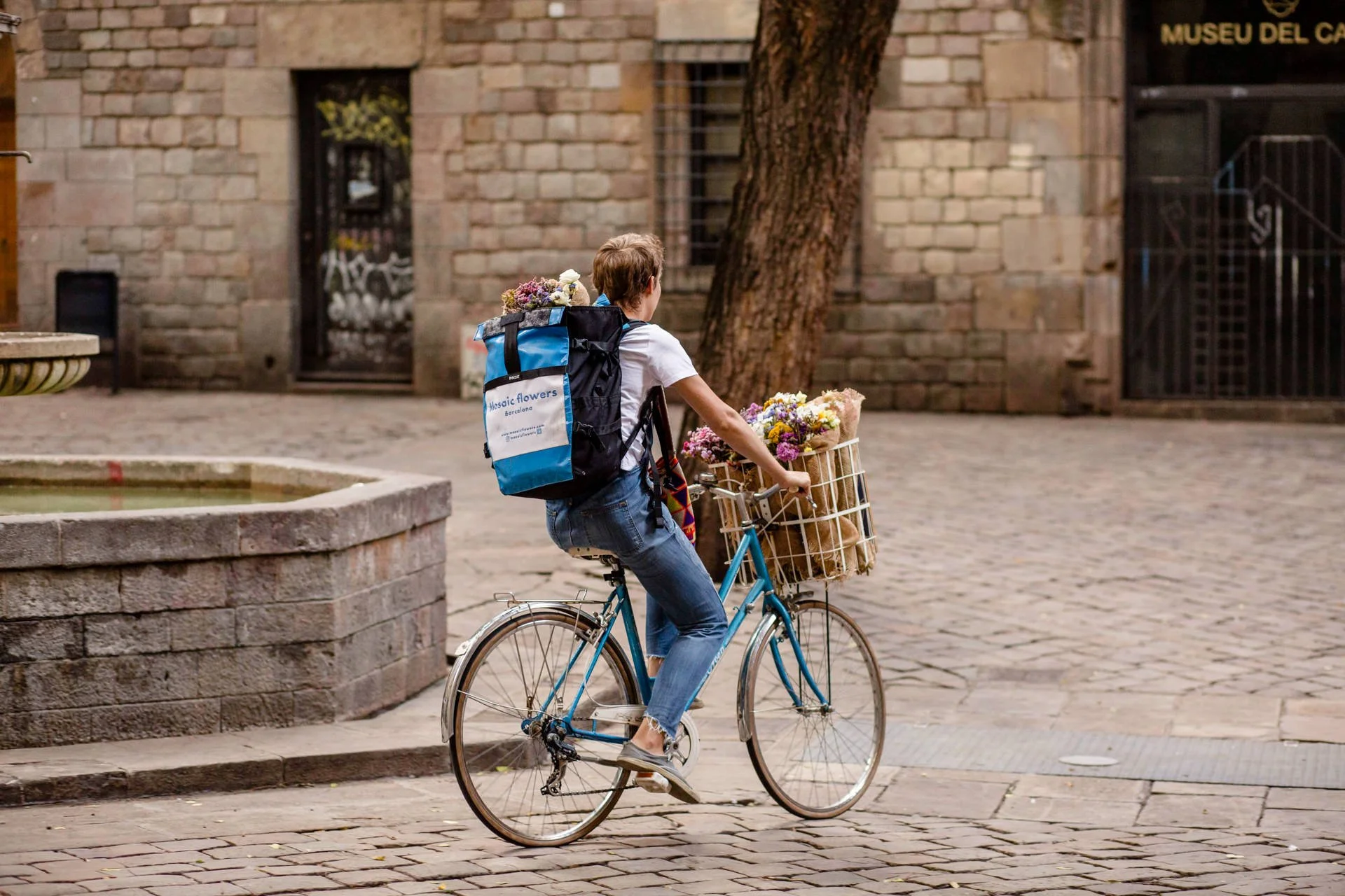 Mosaic Flowers bicycle delivery in the streets of Barcelona, sustainable floral designer for international events