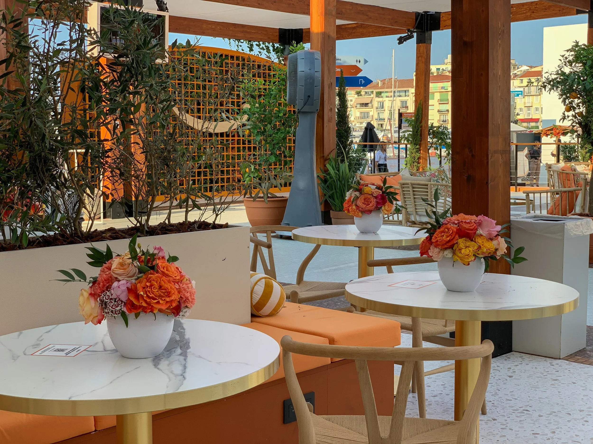 Mosaicflowers terrace floral arrangements designed for Amazon at Cannes Lions Festival 2025, a luxury event set design for an international brand