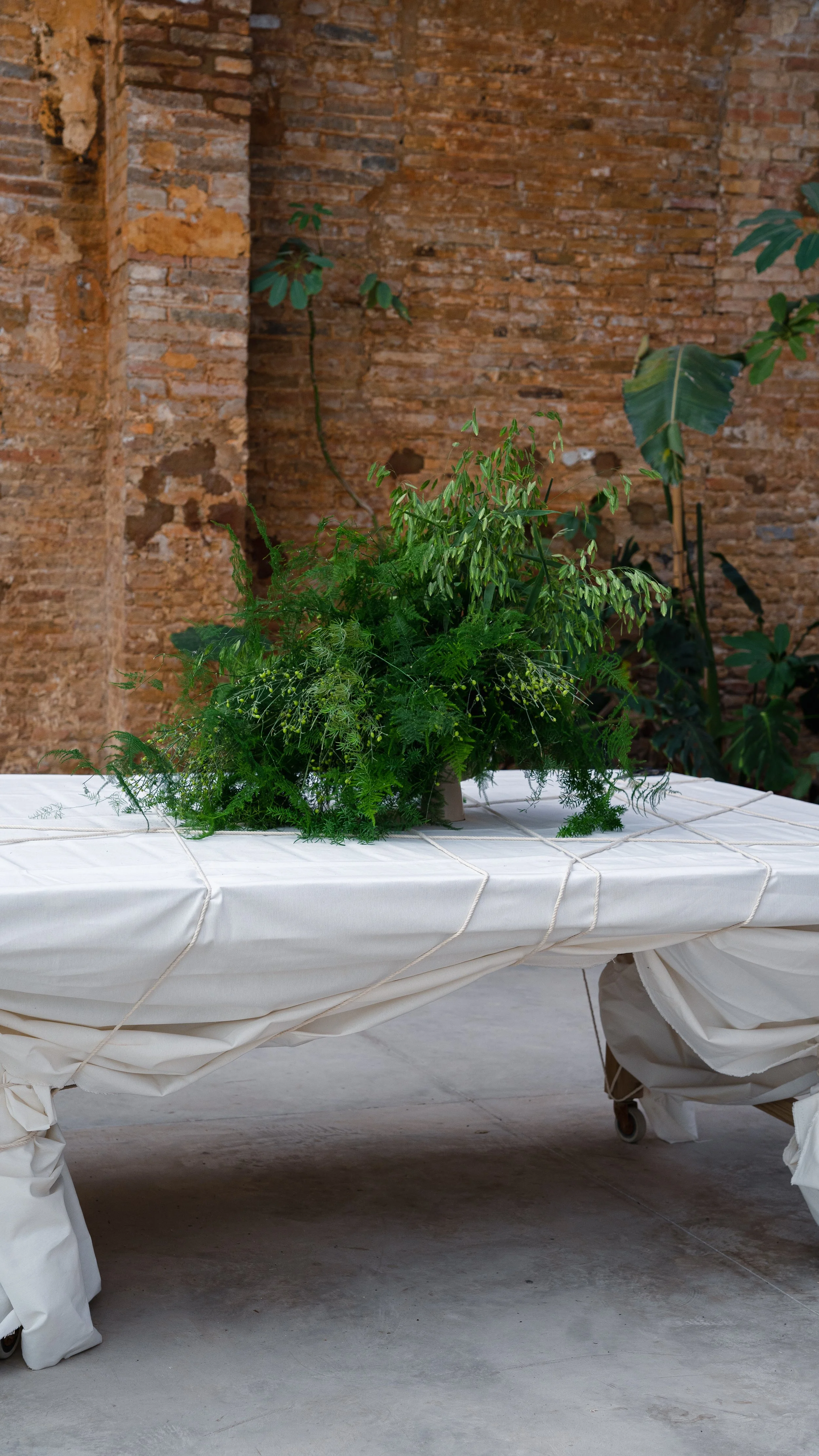 Bespoke foliage composition displayed in an elegant planter for the Pranarôm x HerbalGem event, reflecting modern luxury and exceptional botanical craftsmanship