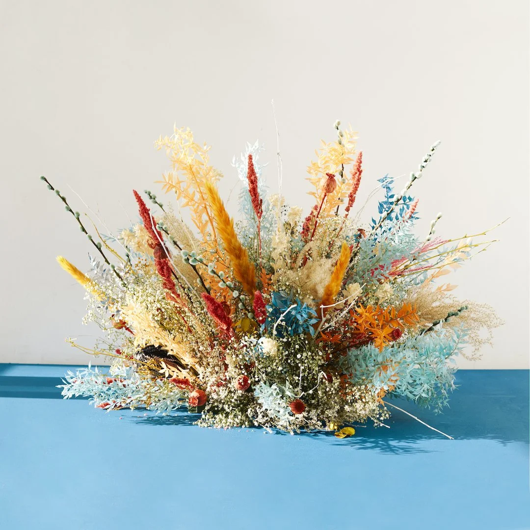 Luxury floral composition “L’Explosion” by Mosaic, showcasing painted preserved flowers for international brands and events in Barcelona