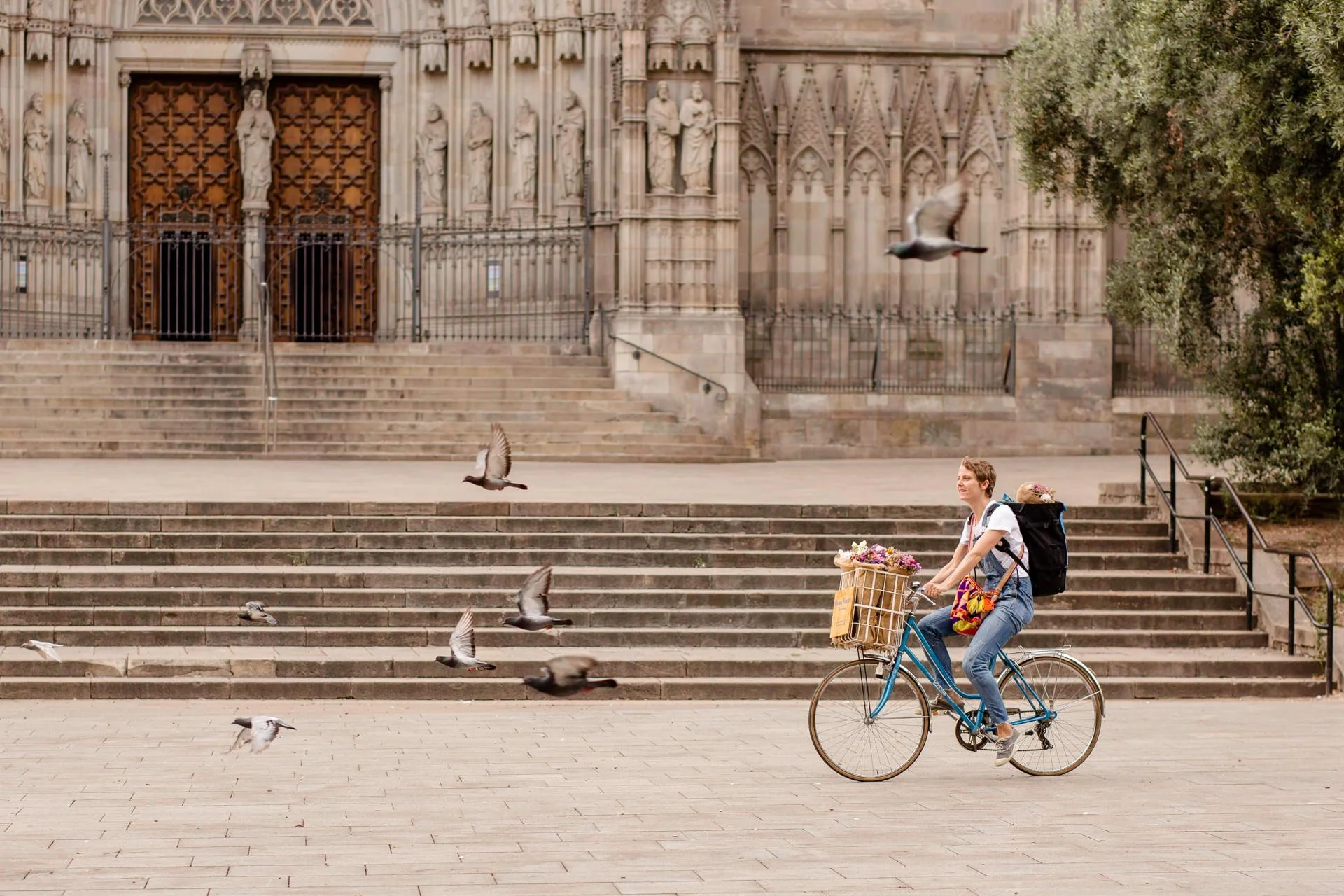 Florist Margaux Bastid delivering flower bouquets by bicycle in Barcelona, floral designer for international events
