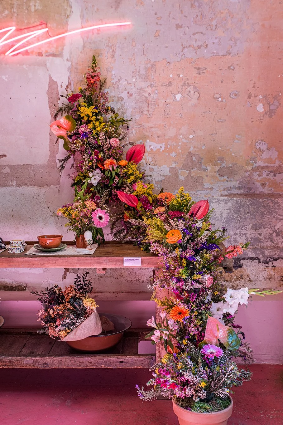 Large climbing floral installation created by Mosaic for “The Flower Experience"
