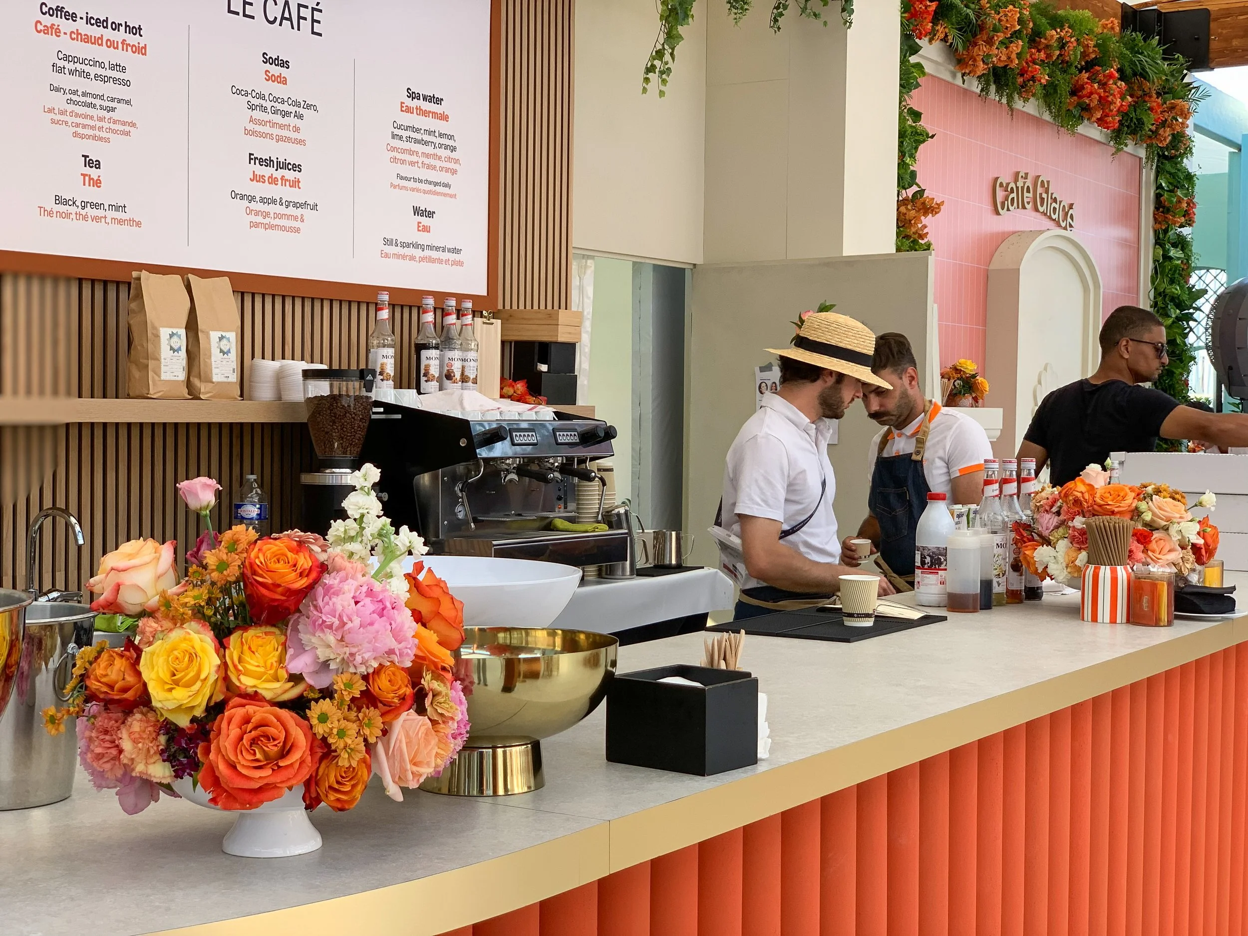 Mosaicflowers luxury floral composition for Amazon café counter set design at Cannes Lions Festival 2025, created for an international brand event