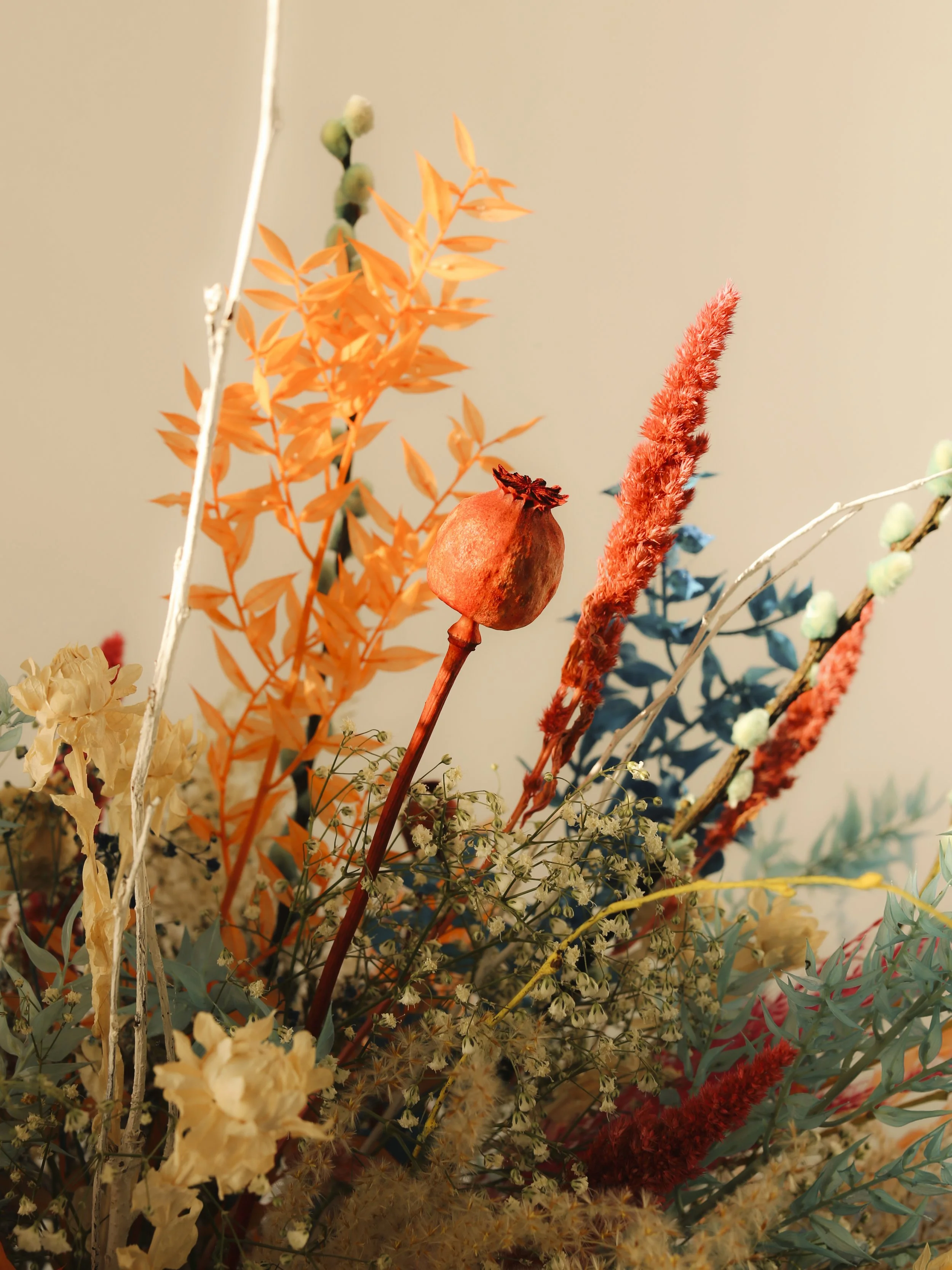 Close-up of vibrant painted preserved flowers from Mosaic’s “L’Explosion,” highlighting luxury floral artistry in Barcelona