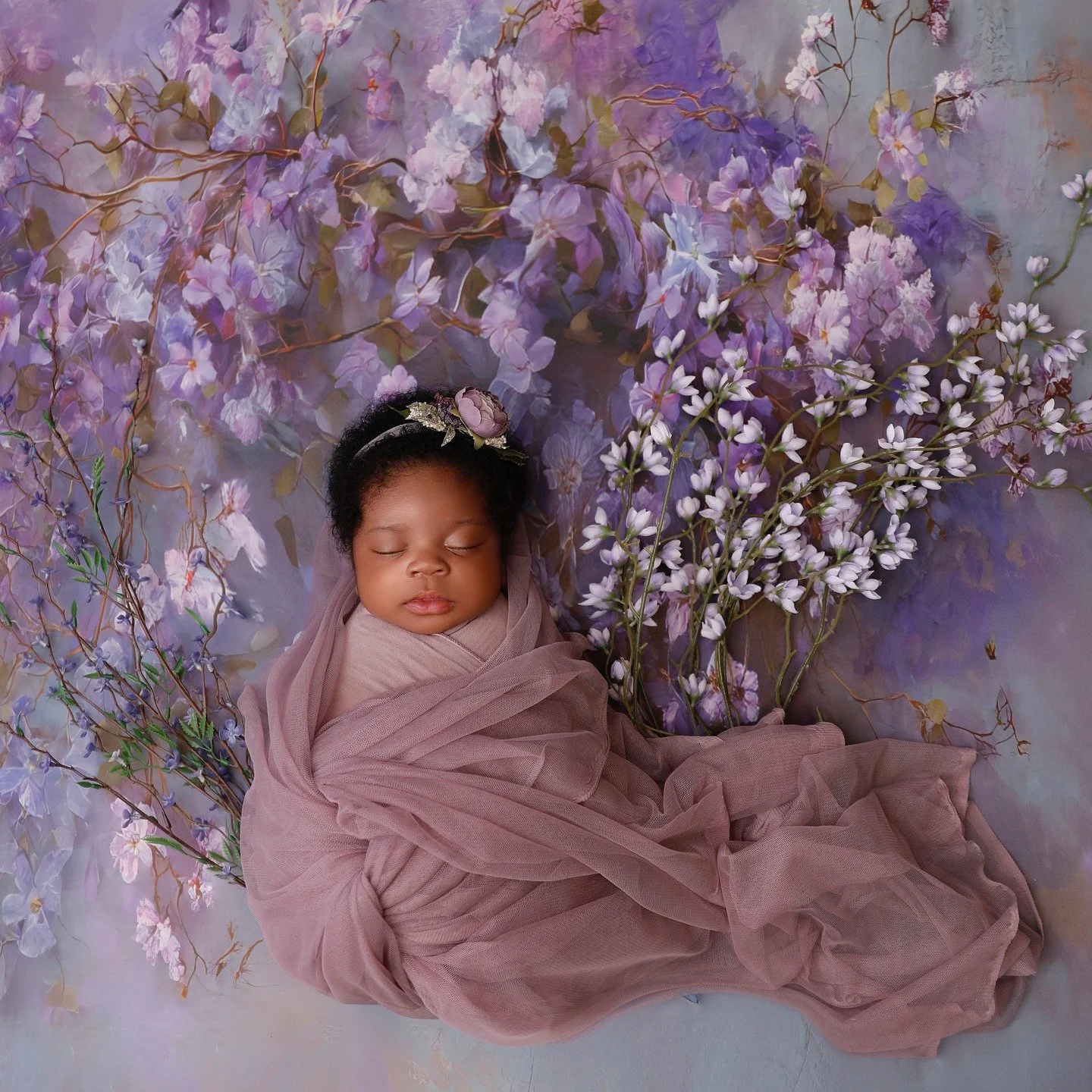 Isn't she darling...she is laying on my new backdrop collection, not digital but a gorgeous drop that I adore so much layered with flowers on top. My drop collection is at https://www.creativedreamdrops.com