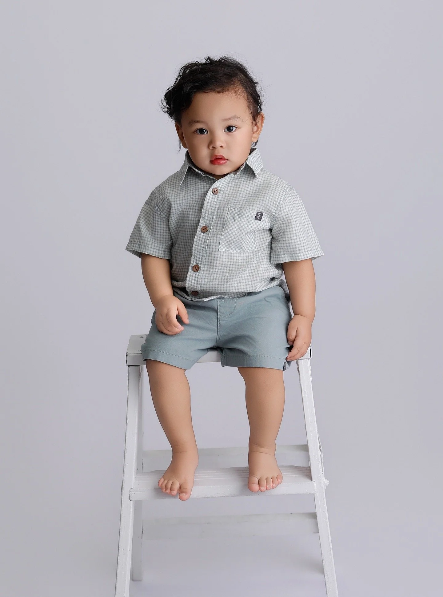 I love children for their unapologetic behavior and for just existing. I started photographing children when my first nephew was born OVER 35 years ago - isn't that insane? I had a used camera from eBay...no training...no nothing... just being an Aun