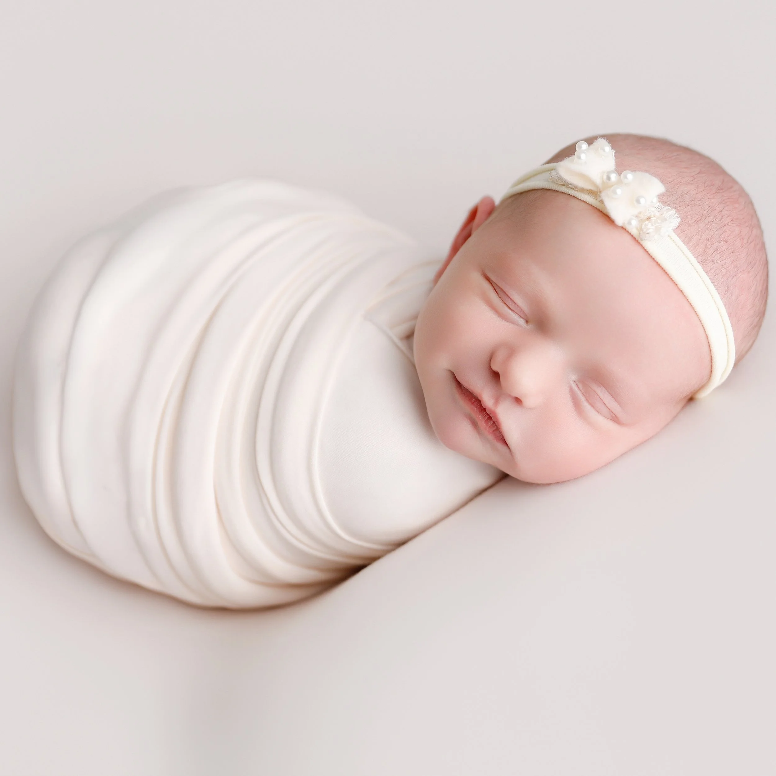 What little girls are made of....simple soft tones....creams are always a favorite...and we can never go wrong with bows. @stillshotsoc Newborn booking www.anabrandt.com