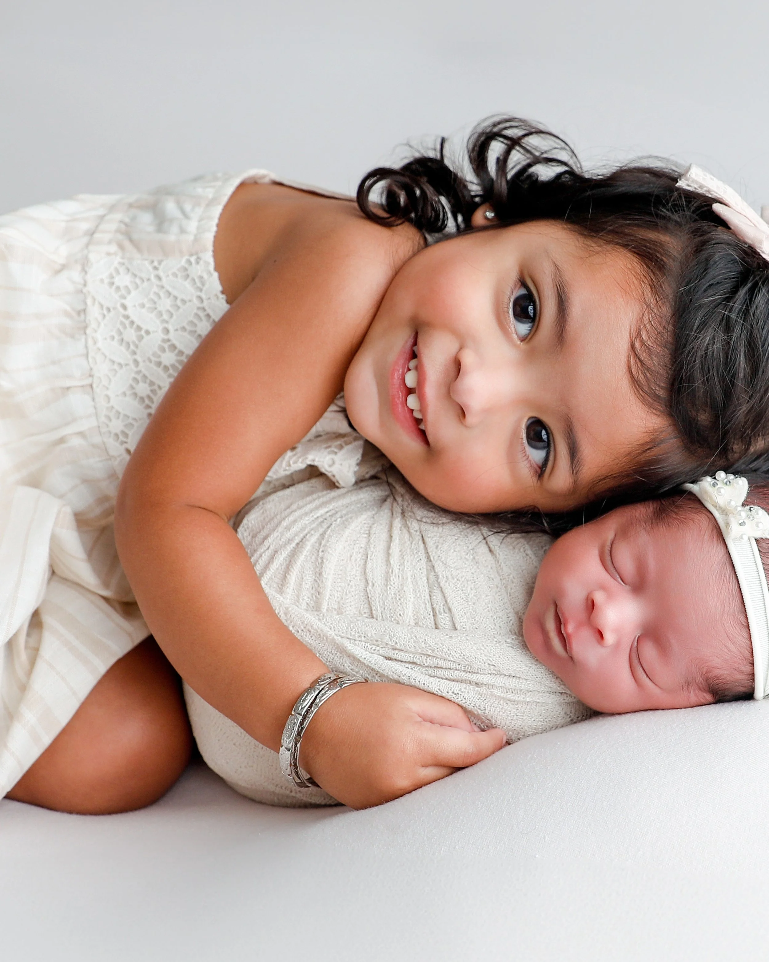 I try to keep things simple. Feed baby, dress baby, wrap, unwrap and go...look at my gorgeous clients family ...so so so pretty and such a privilege. www.anabrandt.com
