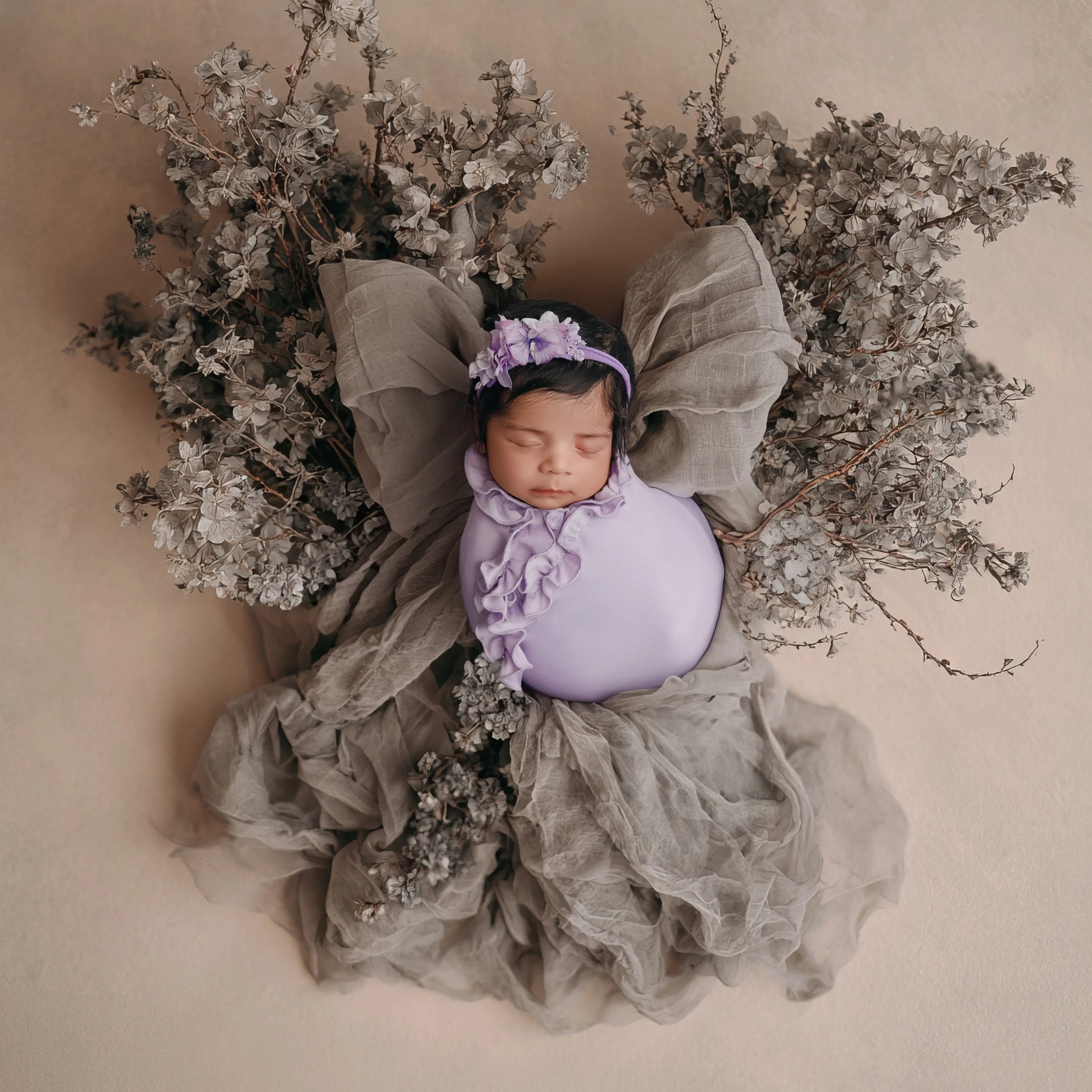 Beautiful babies...our ruffled edge sack wraps and some extra whimsy.