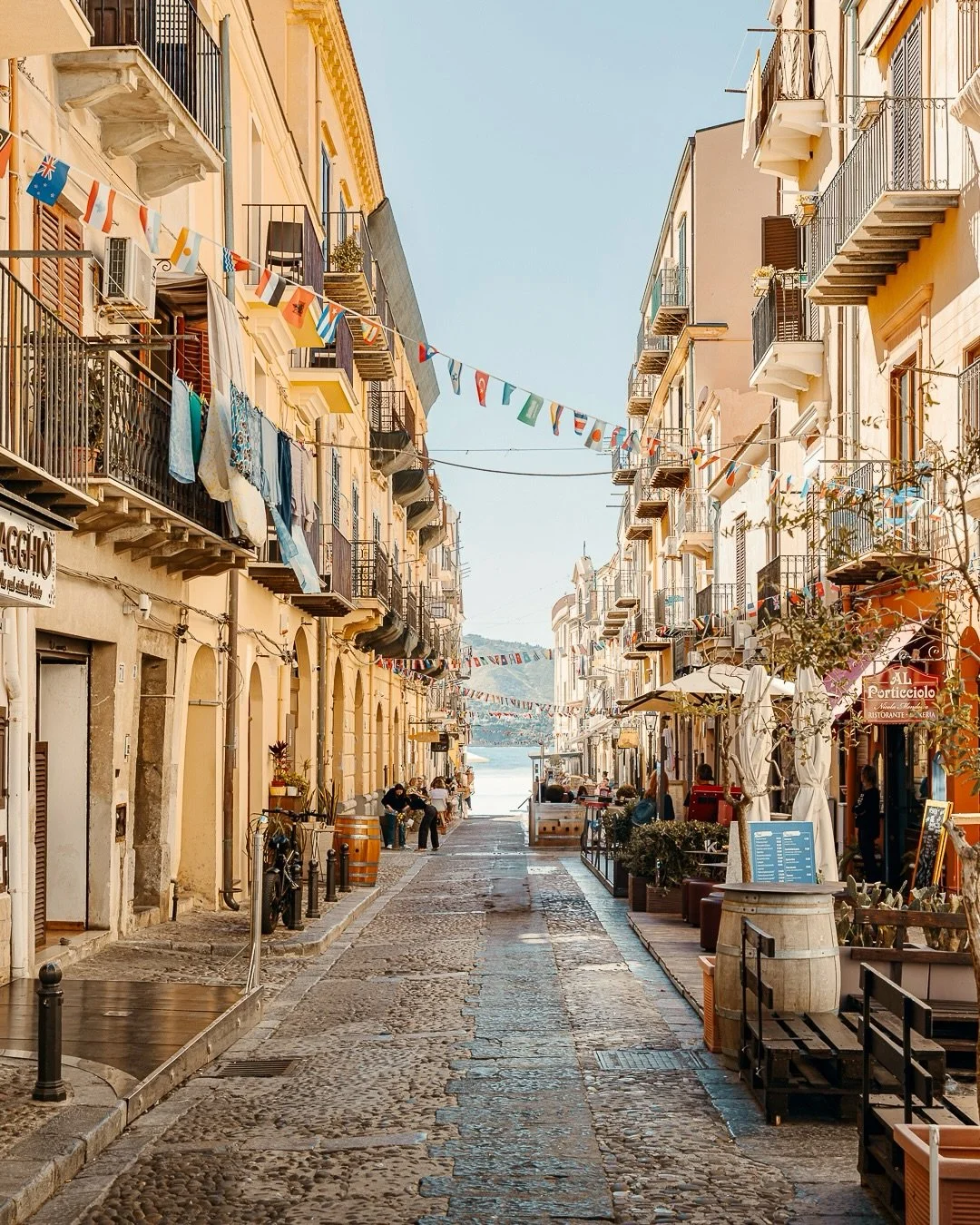 A day wandering Cefal&ugrave; 

Cobbled lanes, laundry drifting between balconies, narrow streets and the sound of waves breaking before you even see the water. 

Cefal&ugrave; is small enough to wander in an afternoon, a little town with lots of cha