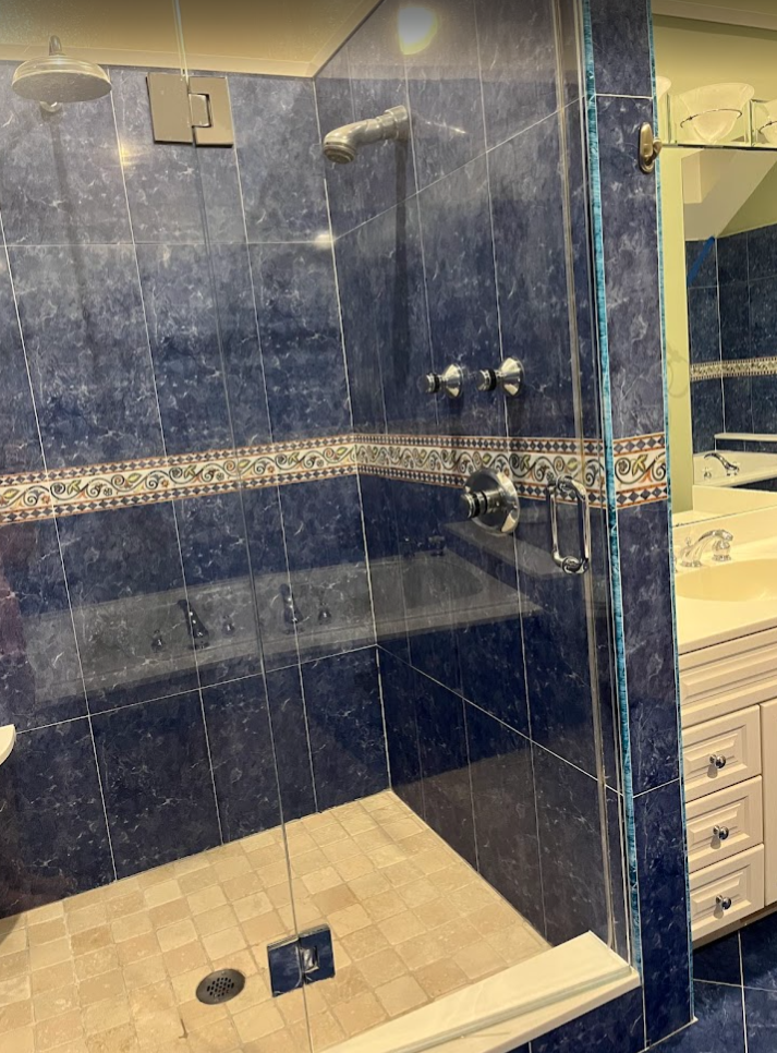 Before: dark, uninspiring shower