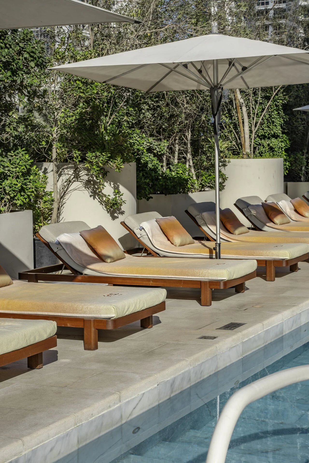 Custom designed bath towels and cushions with sunset colours by Femm Amsterdam X hotel ME Dubai, designed by Zaha Hadid