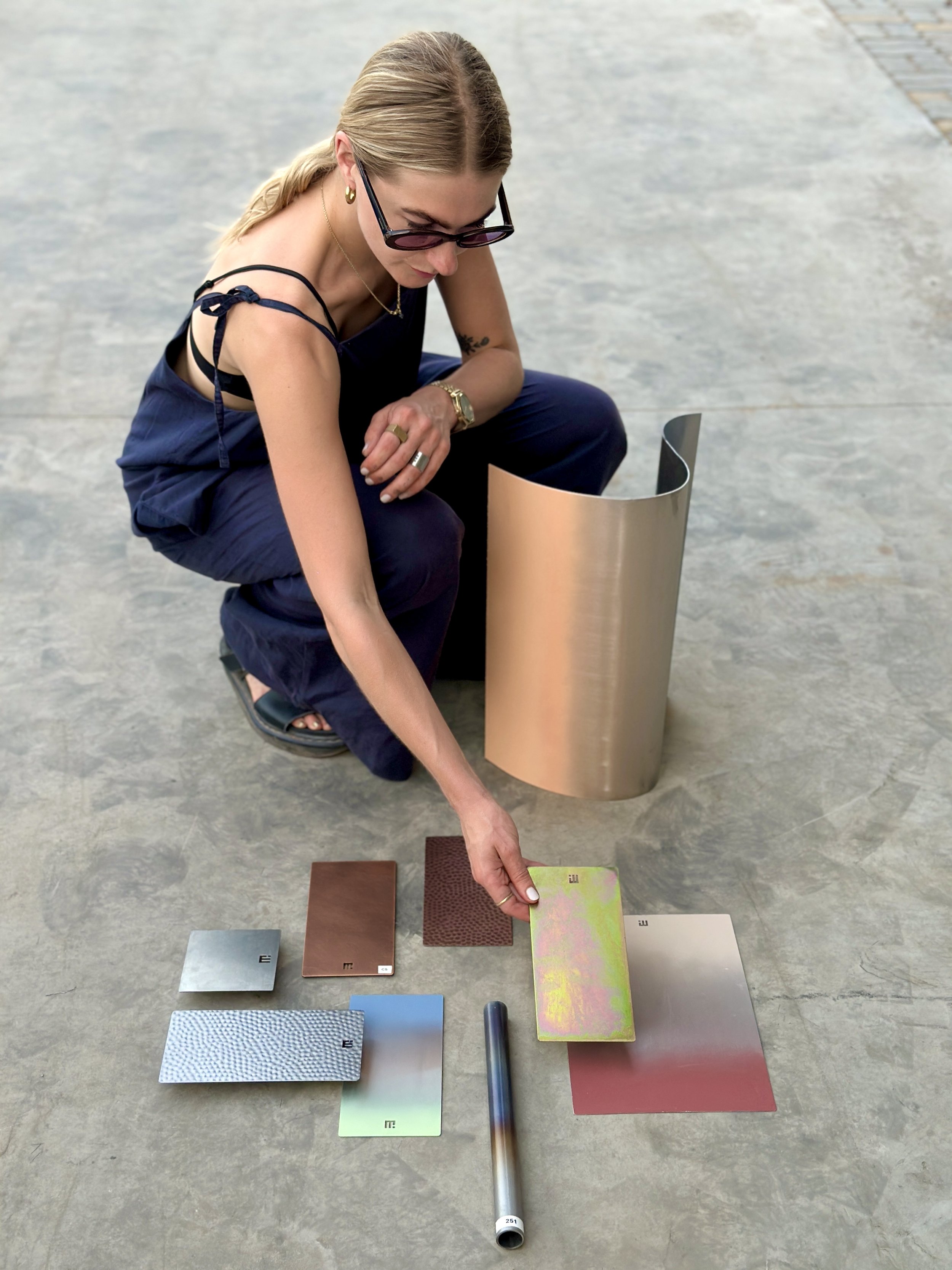 Colorful material samples with a metallic object by Femm Amsterdam