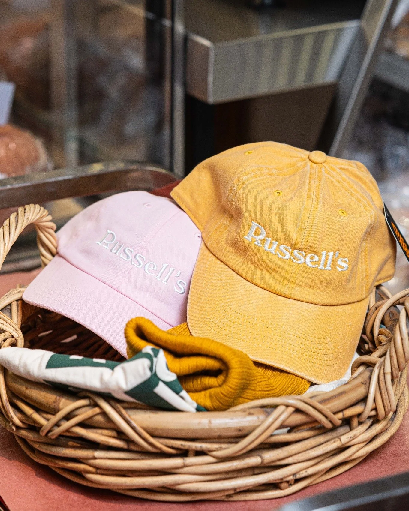 Mix and match Russell&rsquo;s merch &mdash; hats, beanies, T-shirts &mdash; and create a fun, useful bundle they&rsquo;ll actually wear. 🧢👕