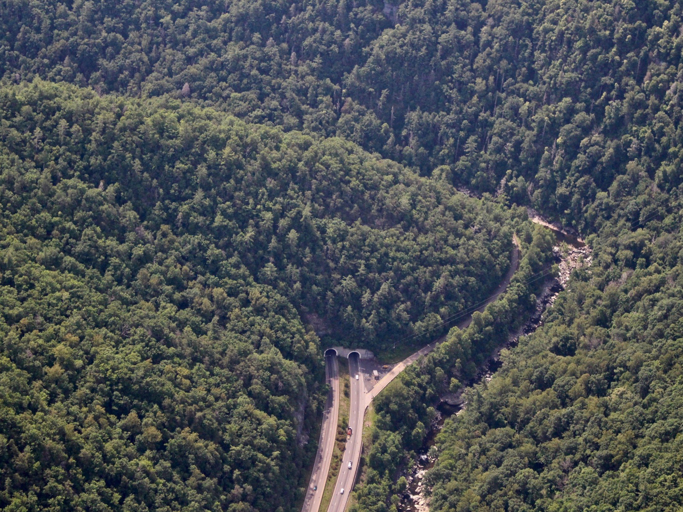  The Pigeon River Gorge’s Double Tunnel, where Interstate 40 passes fully under the mountains, provides some of the best existing connectivity for wildlife within the study area and beyond. Photo: Jake Faber, Southwings 