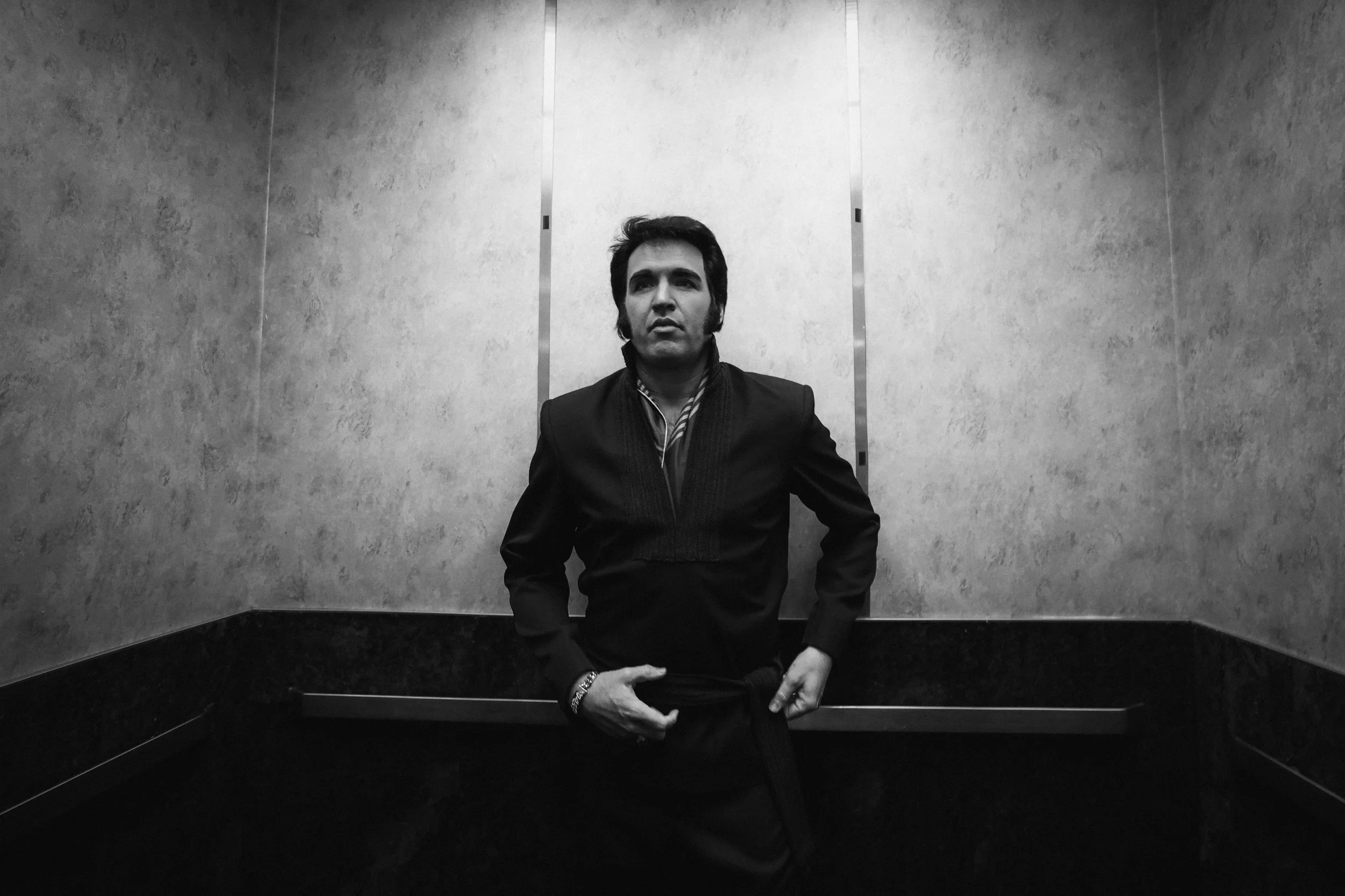 Travis Powell, an Elvis tribute artist, goes up the the same elevator that Elvis Presley used before performing in “1969 Live Concert: The King Returns” at the Westgate International Theater Thursday, July 31, 2025, in Las Vegas. The theater is the s